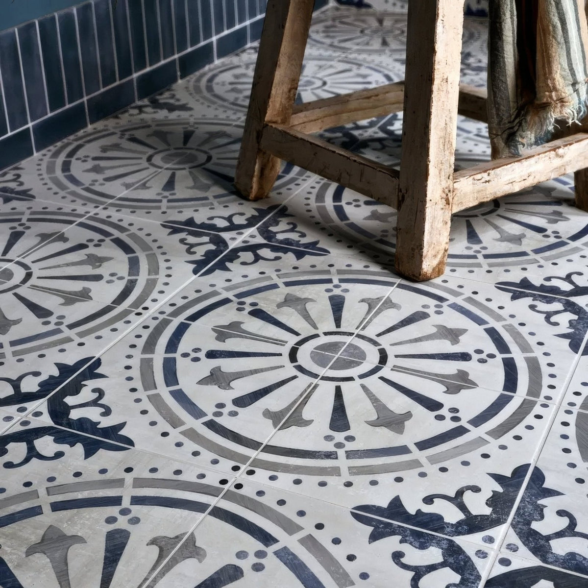 Canero ceramic matt white and navy blue patterned ceramic floor tiles with intricate circular and floral designs