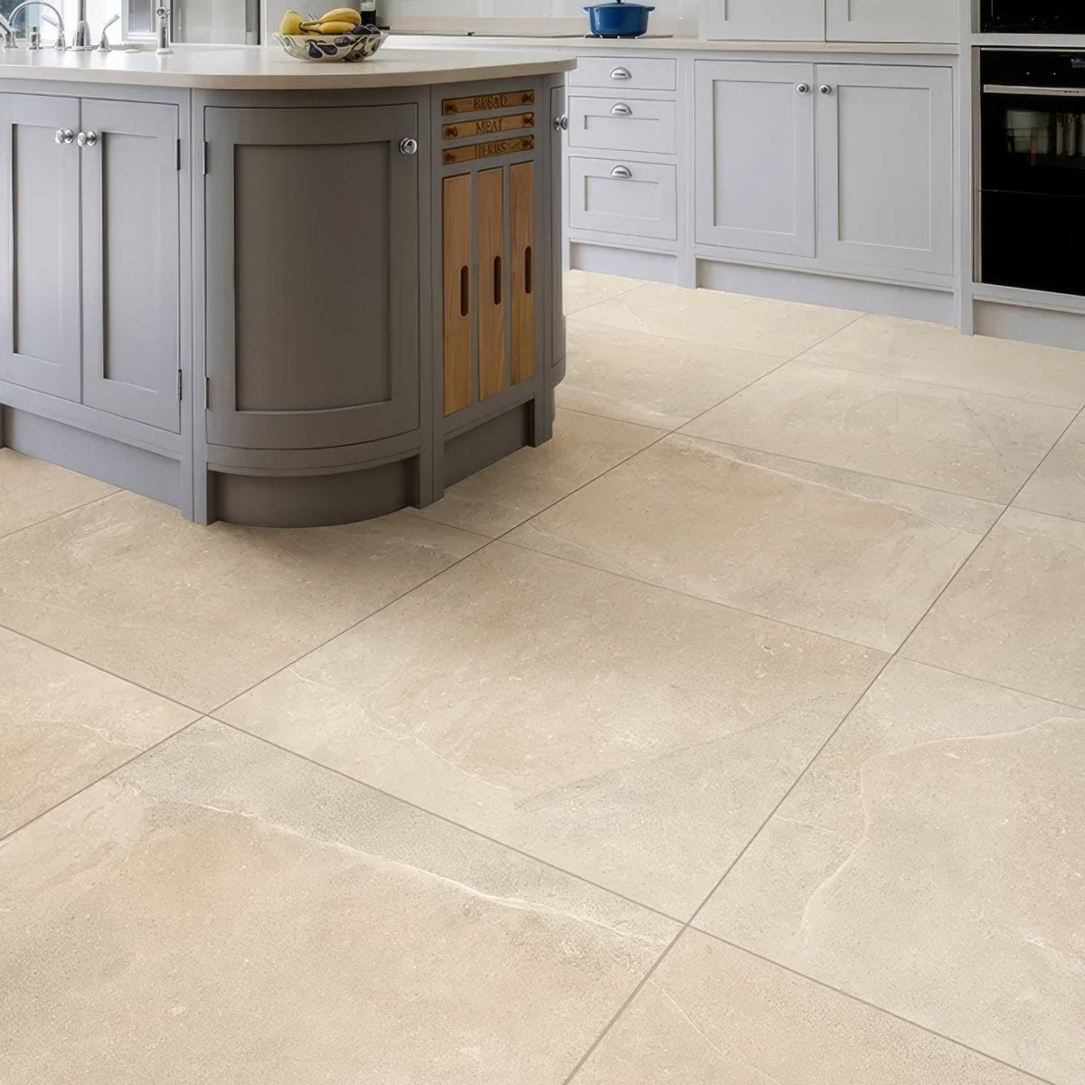 Beige stone-effect porcelain kitchen floor tiles with subtle natural veining 80 x 80cm from dorset