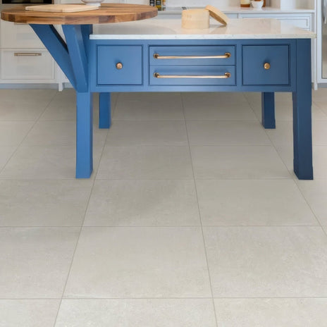 Blue kitchen island with white dorset porcelain countertop 80x80cm and gold hardware accents