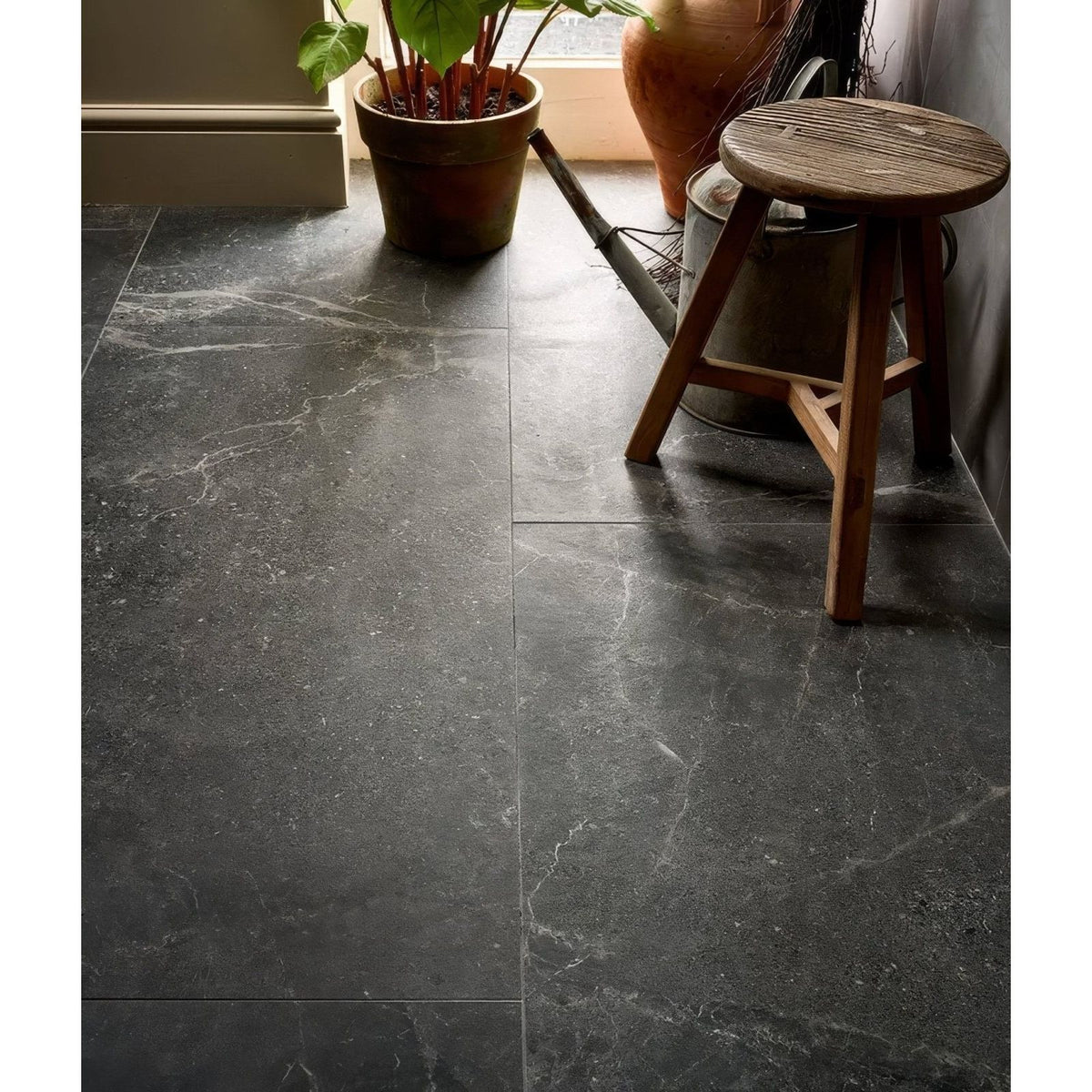 Etna porcelain matt dark gray marble-effect floor tiles with subtle white veining 59.5x59.5cm