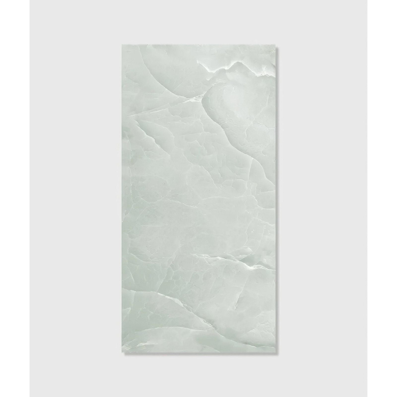 Illuson whisper onyx porcelain polished lagoon tile is pale green ceramic with smooth glossy finish and subtle veining