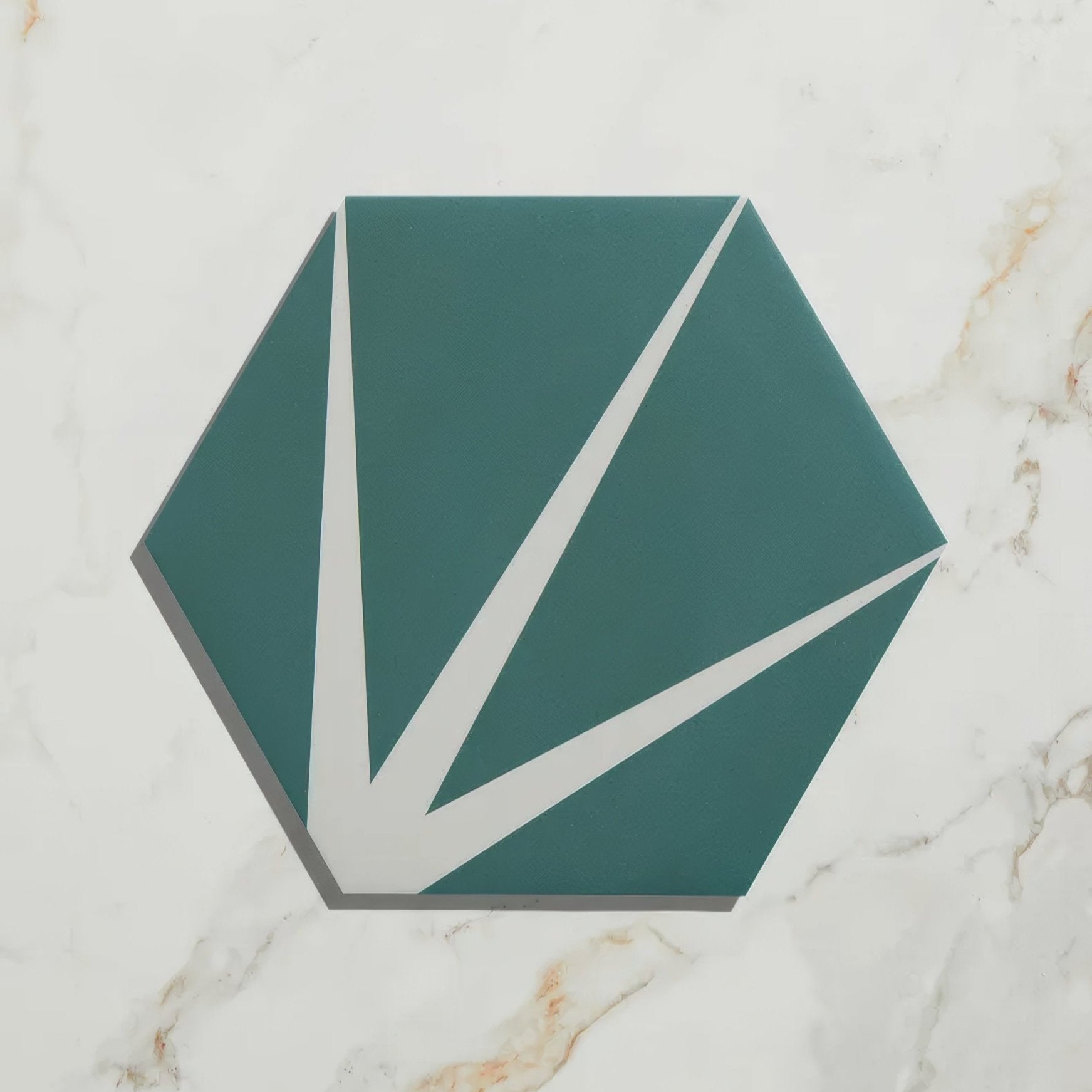 Teal hexagonal porcelain tile with white geometric lines from lily pad porcelain eucalyptus collection