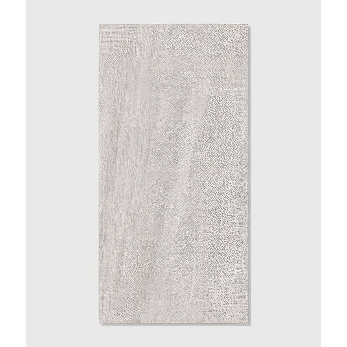 A rectangular light gray pembroke porcelain satin tile with subtle wood grain and pebbled surface finish 60 x 120cm