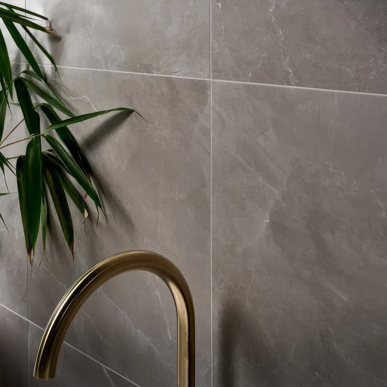 Treviso Porcelain Matt 59.5 x 59.5cm grey marble-effect tiles with a gold tap