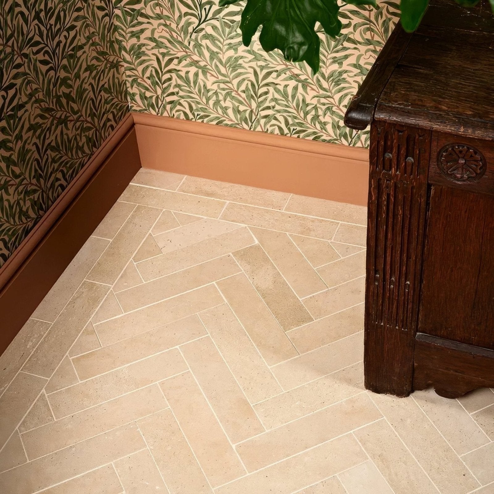Beige herringbone patterned portland limestone honed parquet floor tiles with natural stone texture