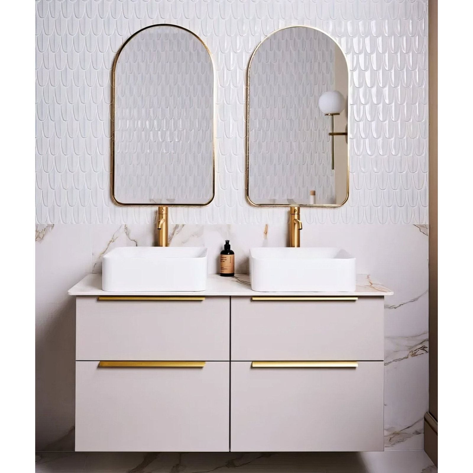 Preen Porcelain Mosaic White white porcelain fish-scale mosaic with a white vanity and gold hardware