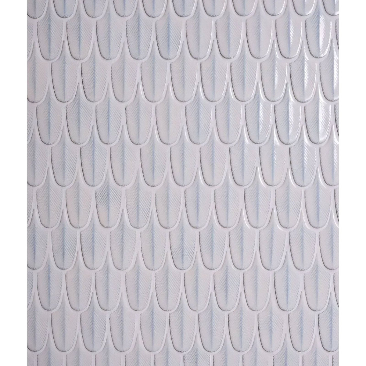 Preen porcelain mosaic white featuring white ceramic tiles with a subtle glossy finish and embossed scale pattern