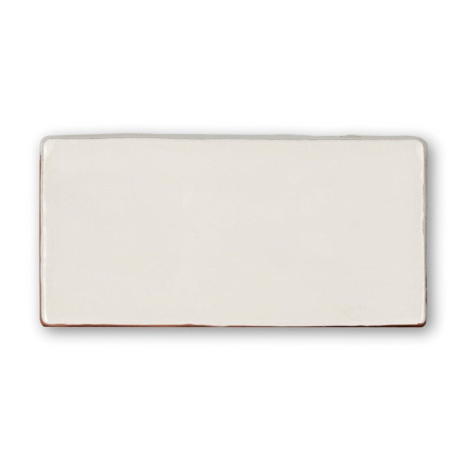 Cream-colored rectangular ceramic tile provence menton rectangle with smooth glossy finish and slightly rounded edges