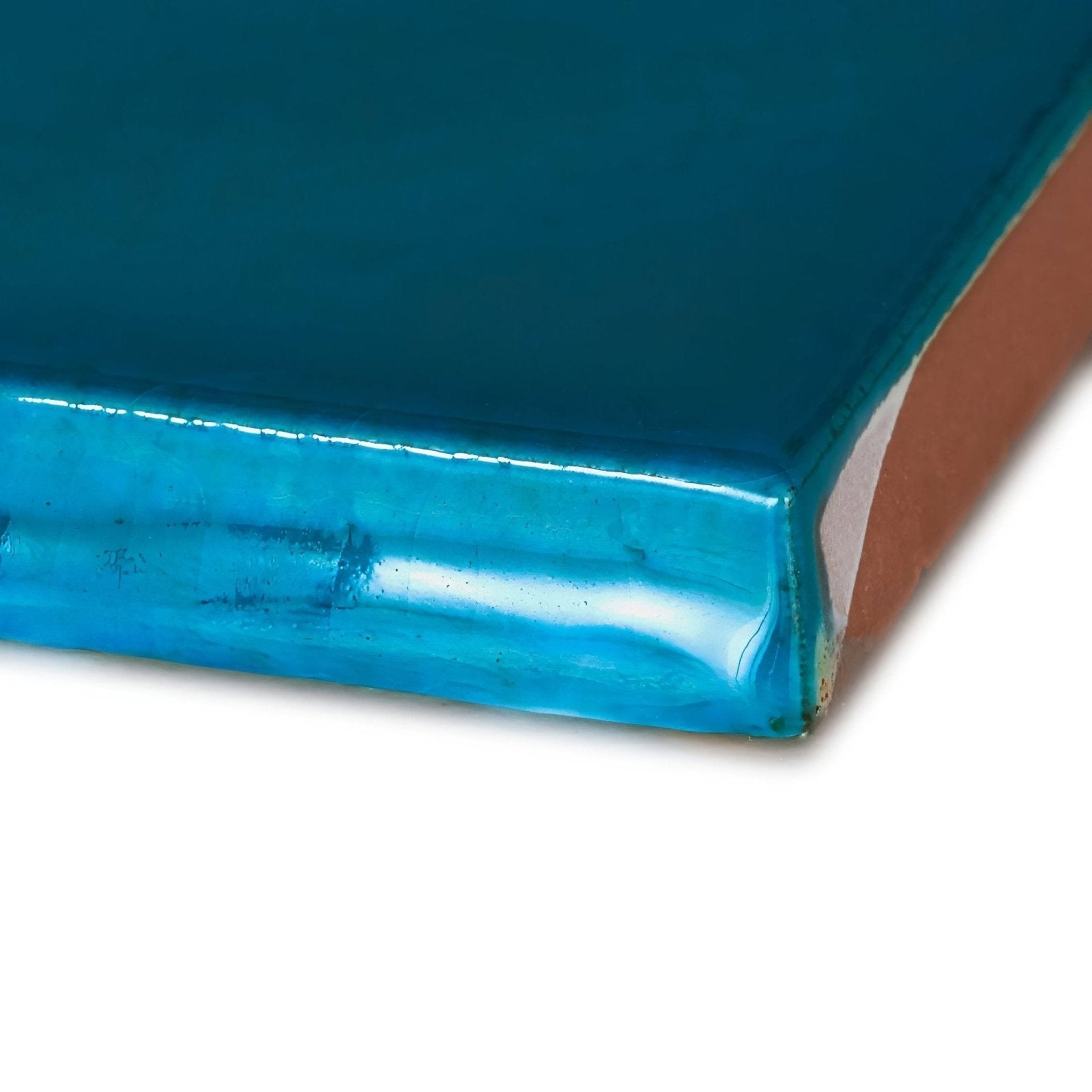 Provence monaco square teal glass tile with a glossy finish and visible edge detail