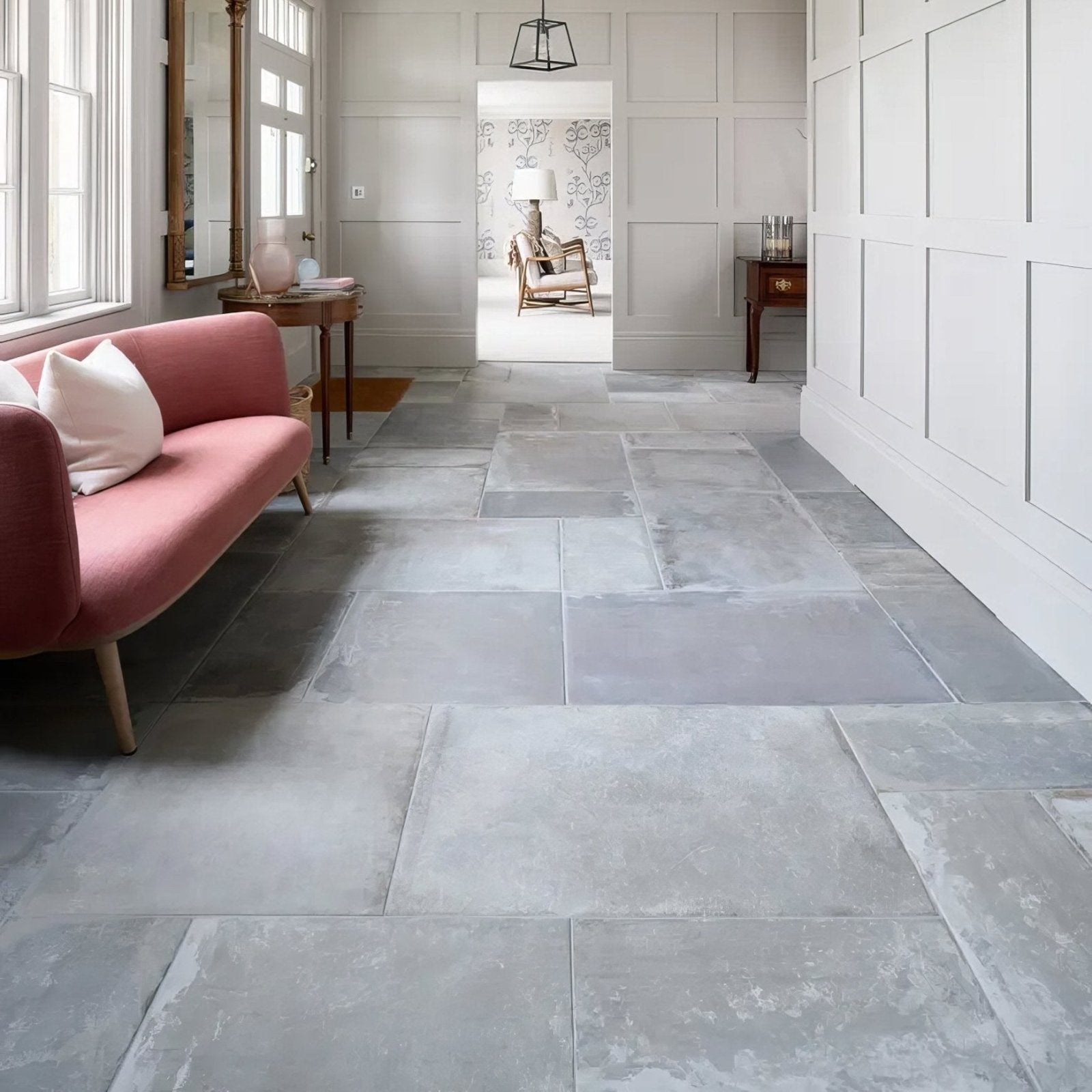 Gray stone porcelain floor tiles with a matte slightly textured finish from provence porcelain cenere collection