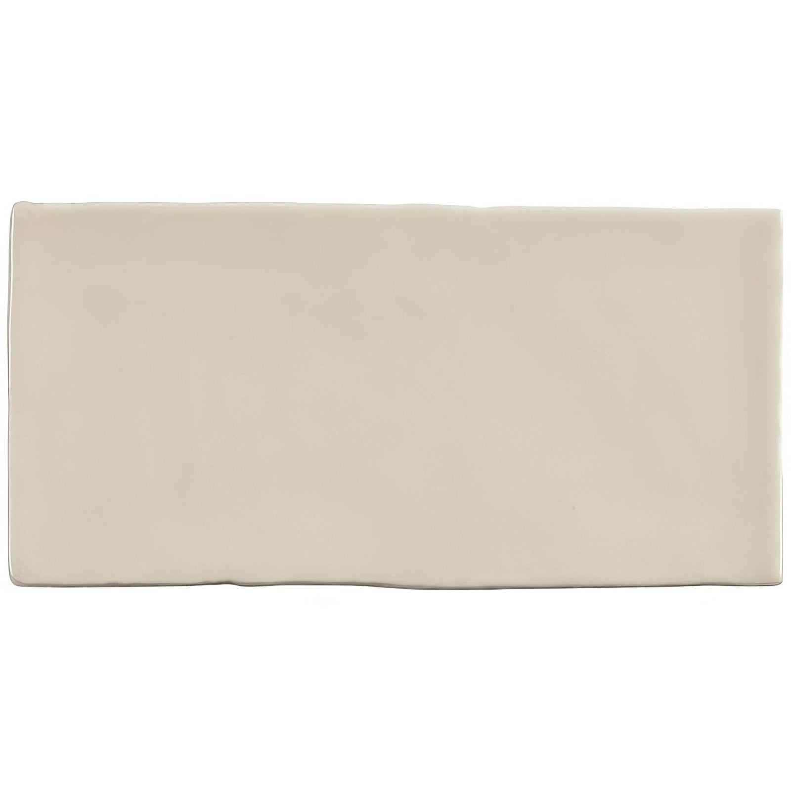 Beige pumice brick tile with a smooth slightly padded rectangular surface for decorative and construction use