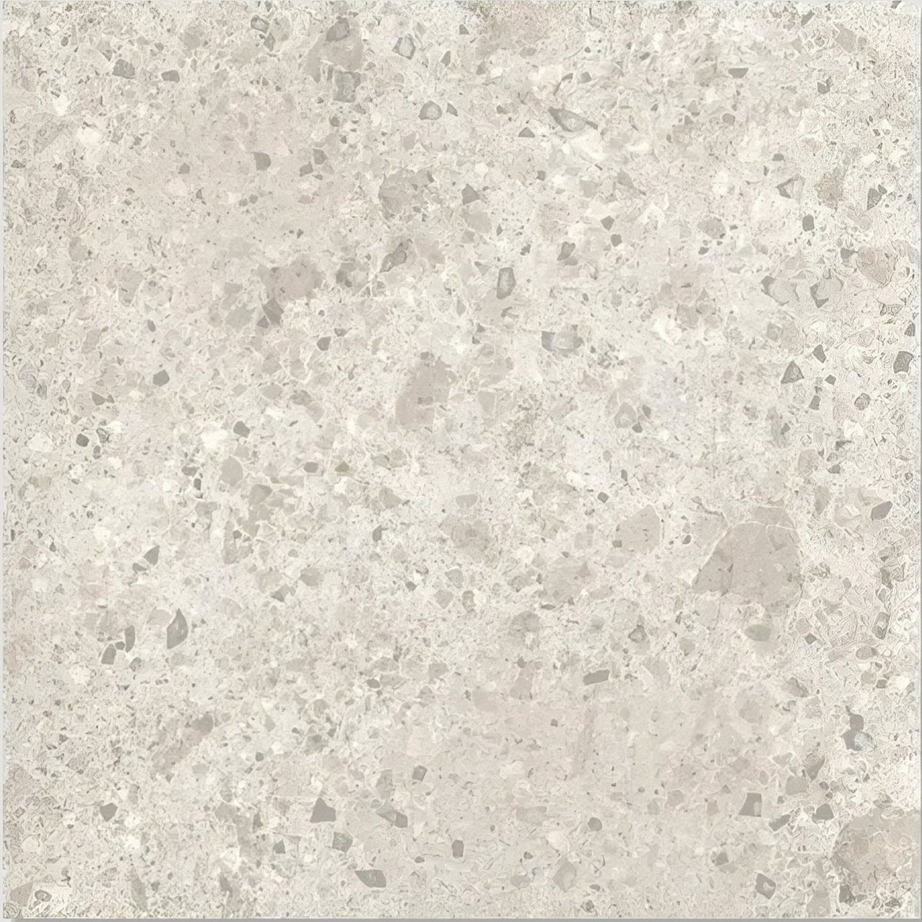Pumice porcelain off white light gray terrazzo tile with speckled darker gray and white flecks pattern