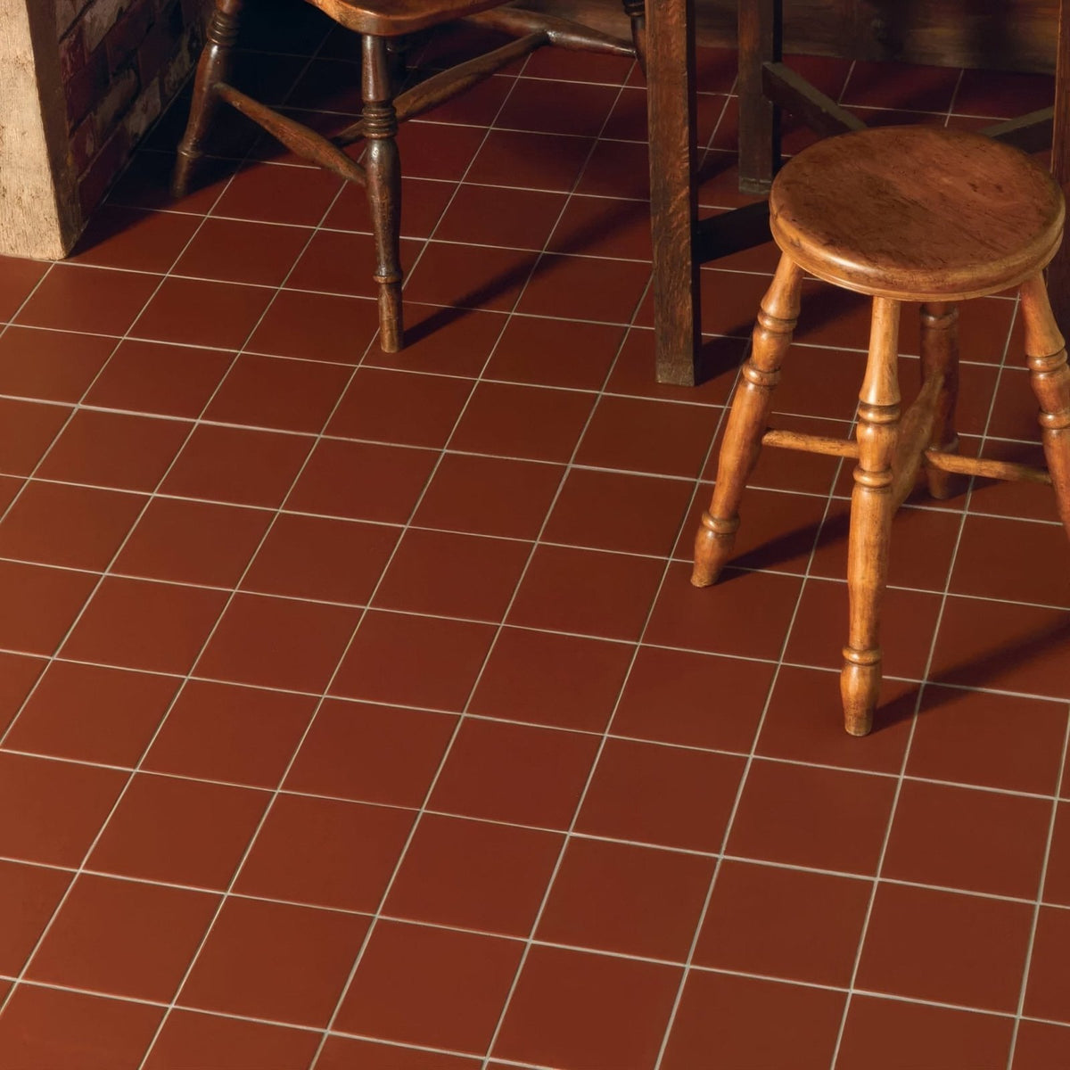 Red flat quarry tile 148x148x9mm terracotta square floor tiles with white grout lines in terracotta color