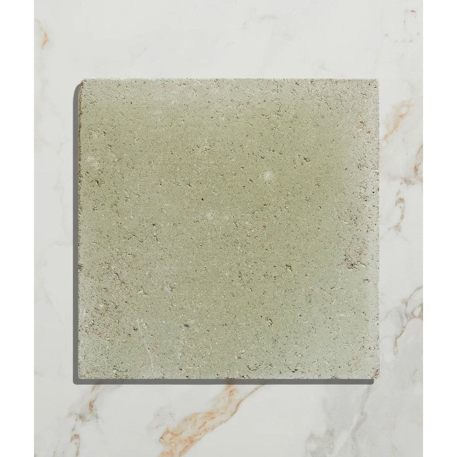 Square textured gray reform composite stone tumbled mint tile with a subtle speckled finish