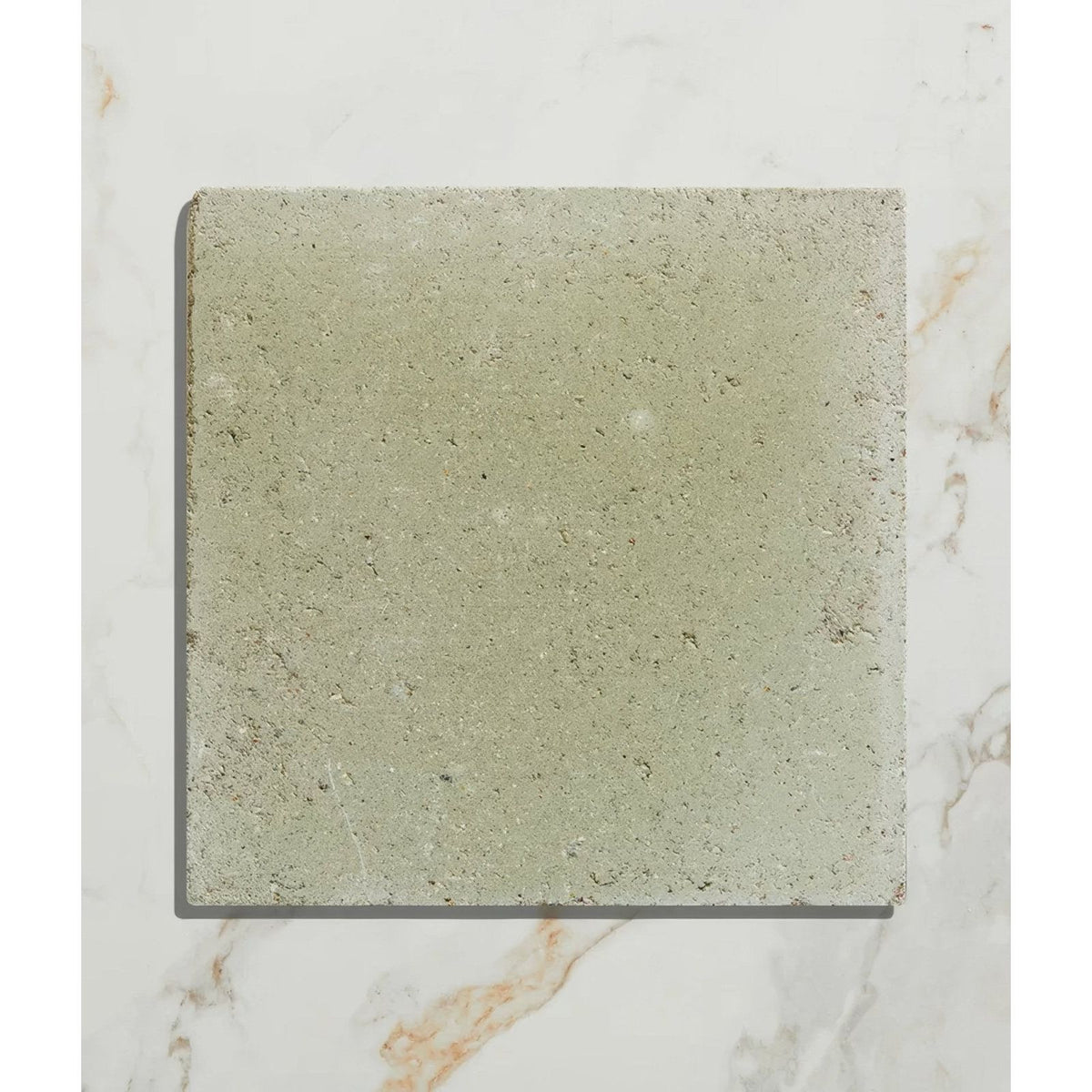 Square textured gray reform composite stone tumbled mint tile with a subtle speckled finish
