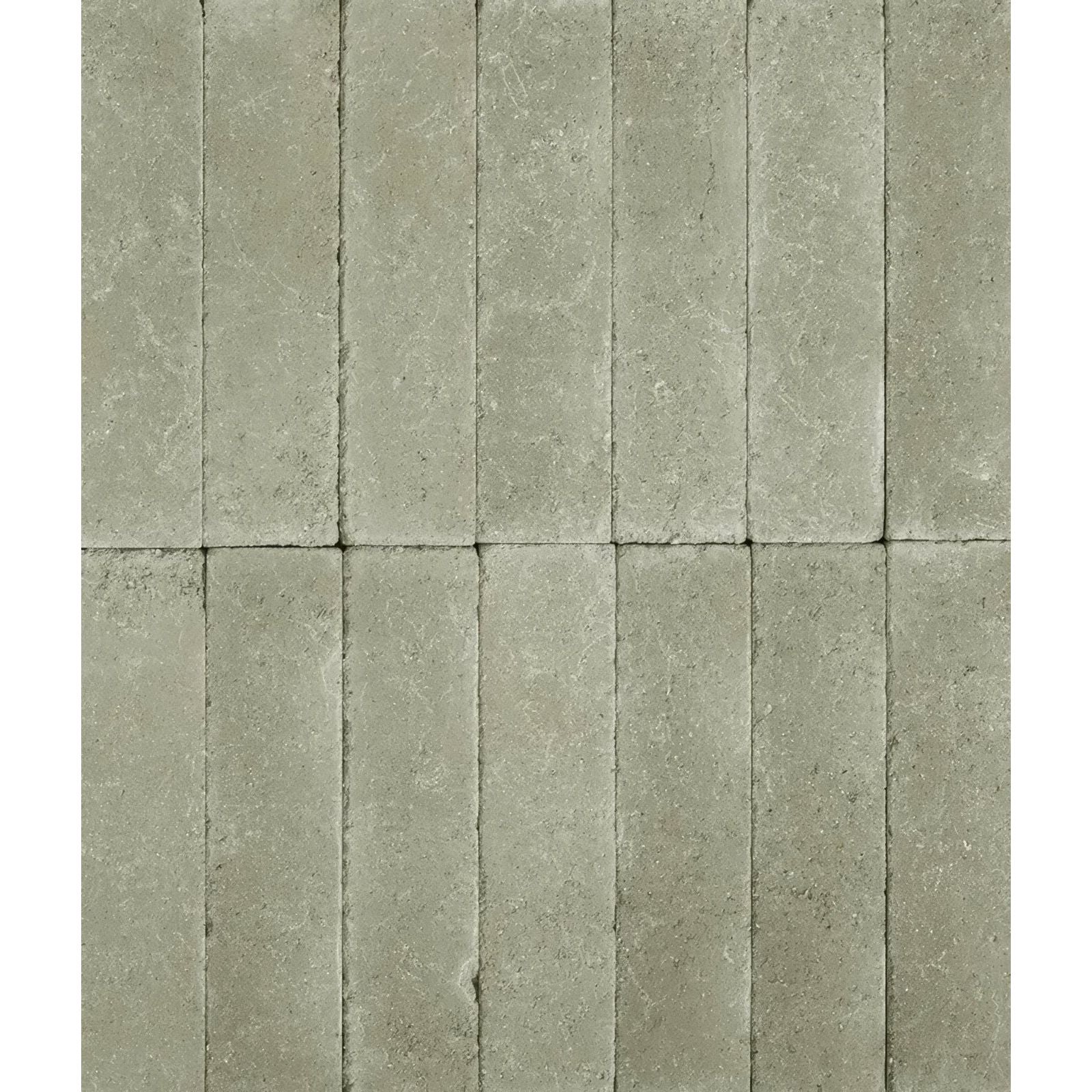Gray stone tiles with textured natural finish arranged in vertical rows reform composite stone tumbled mint