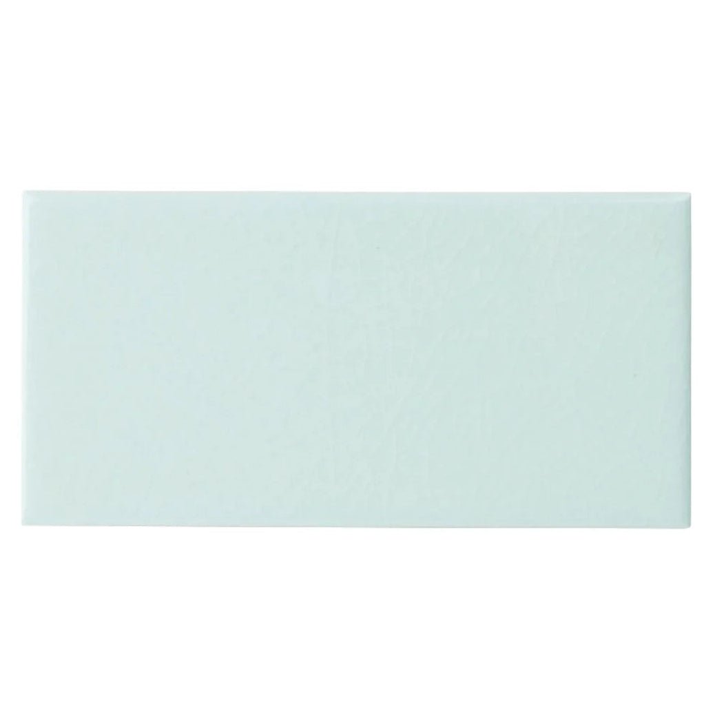 A rectangular matte finished mint green ceramic tile from retro metro lido blue 7.5 x 15 glazed collection