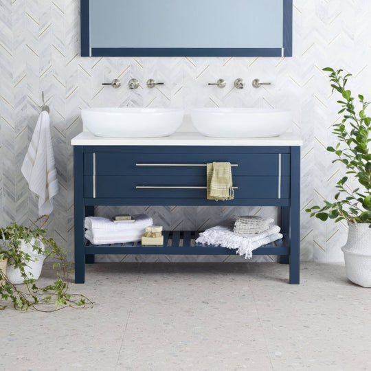 Navy blue reykjavik pebble bathroom vanity with white countertop and two white vessel sinks 60 by 60 cm