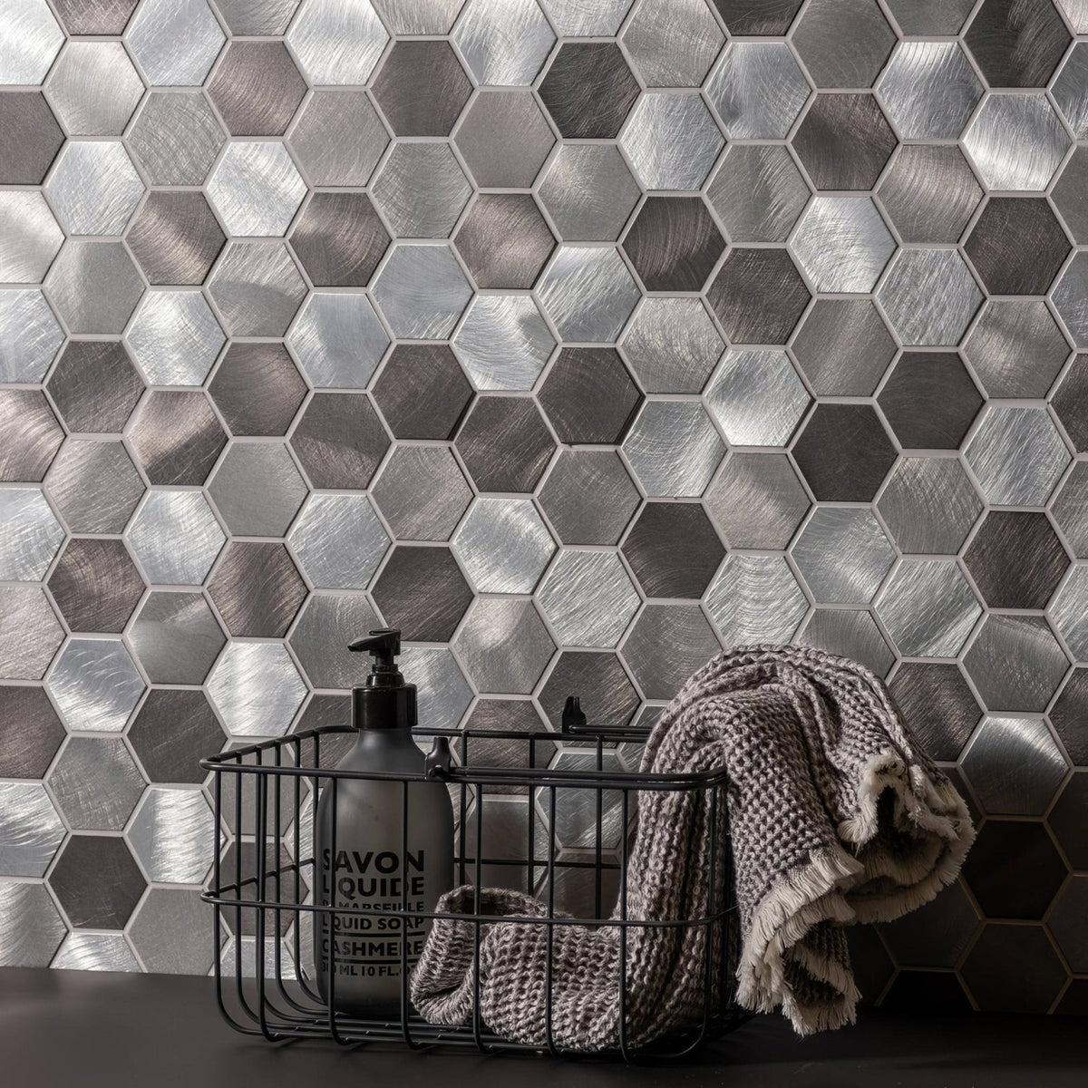 Silver hexagonal metal mosaic tile wall from the Rhea grey and silver mixed hexagon mosaic collection