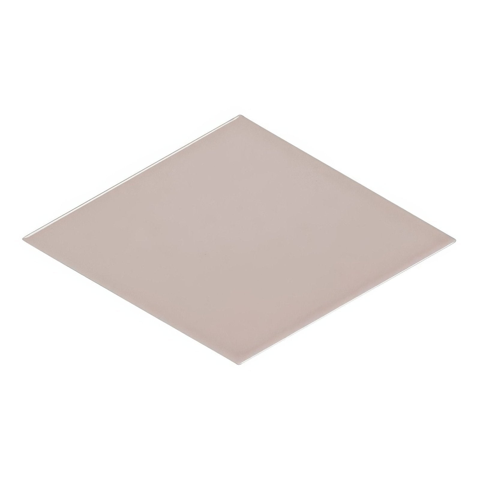 A sleek square metallic plate with smooth reflective surface and rounded edges for rhomboid pink ceramic wall tile