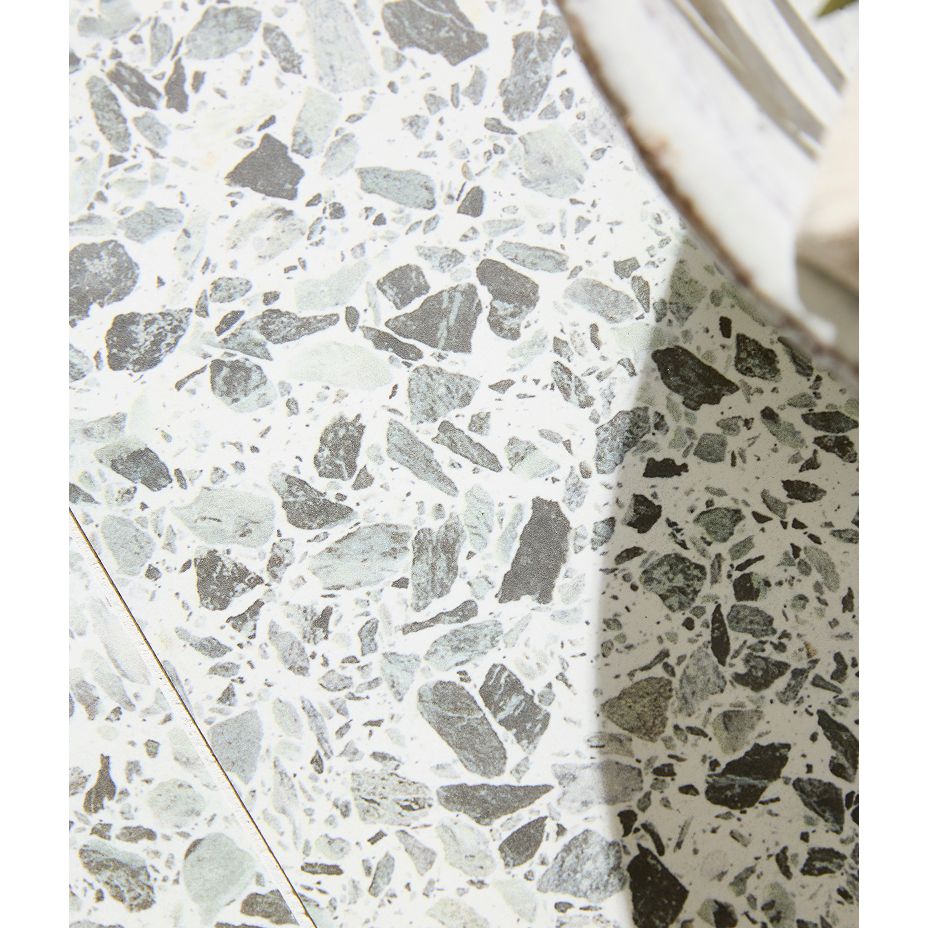 Rialto Porcelain Vert green terrazzo tile in an interior scheme