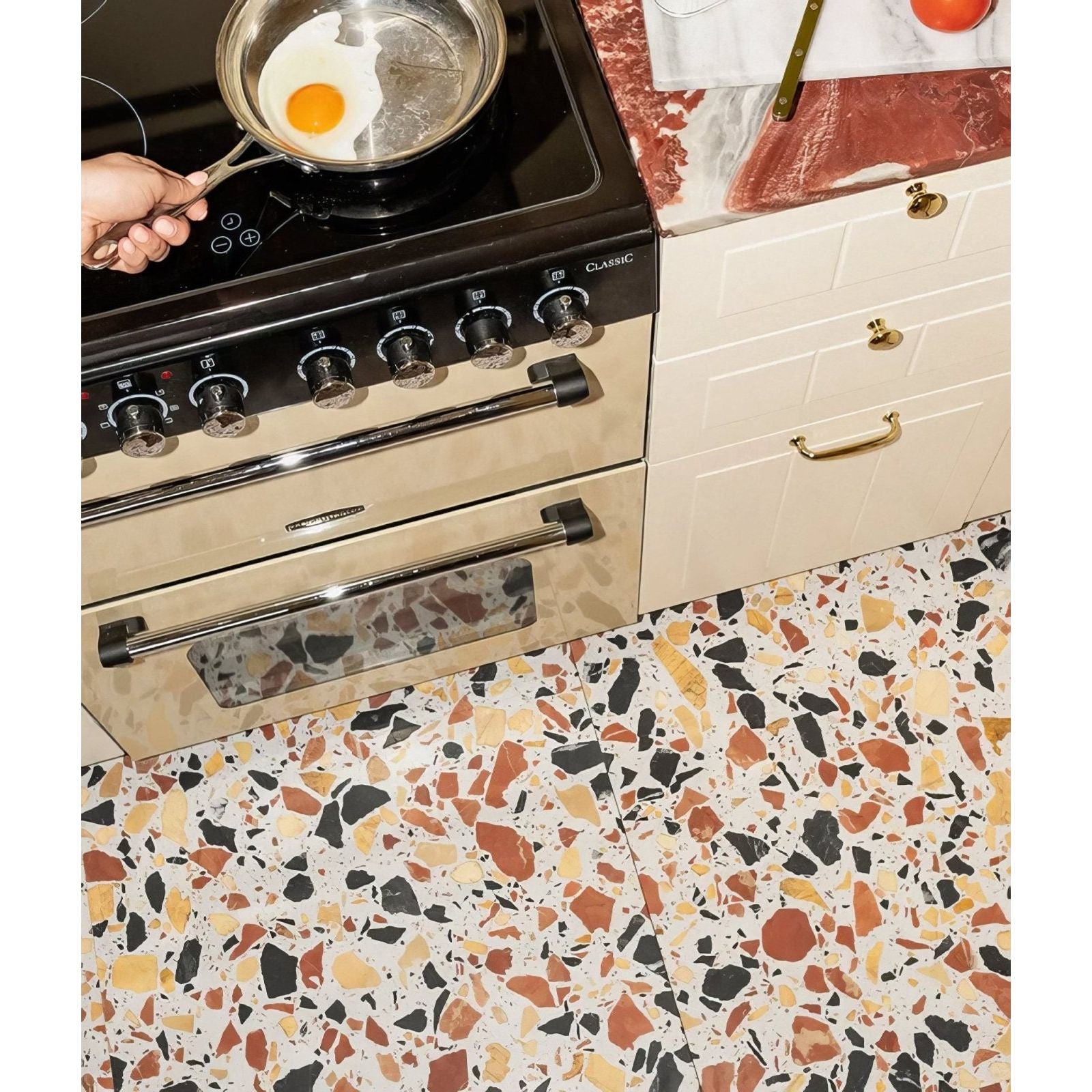 Rialto Terrazzo San Marco Honed white terrazzo tiles with an electric stove