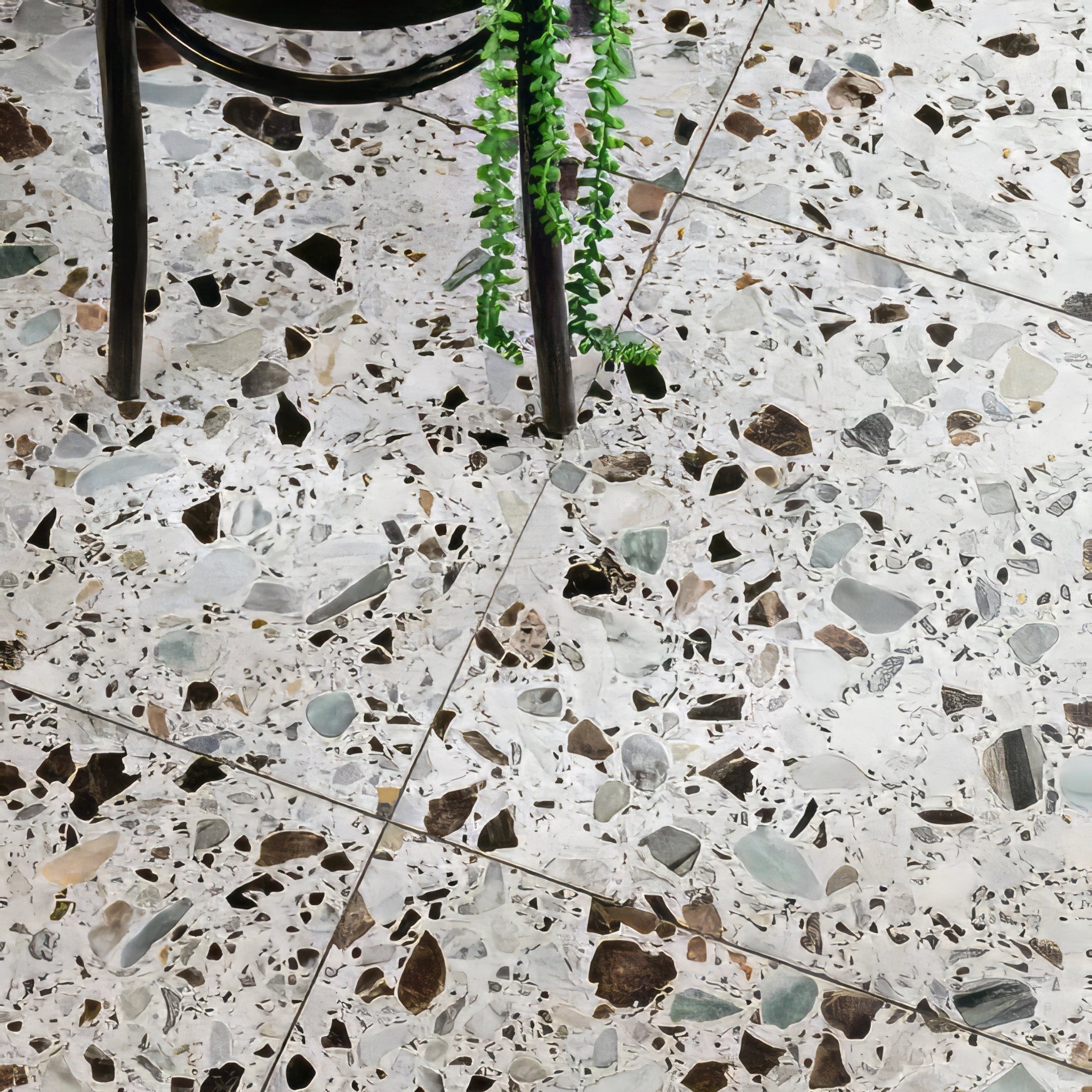 Rialto terrazzo San Polo honed floor with white gray black and brown stone fragments in light cement matrix