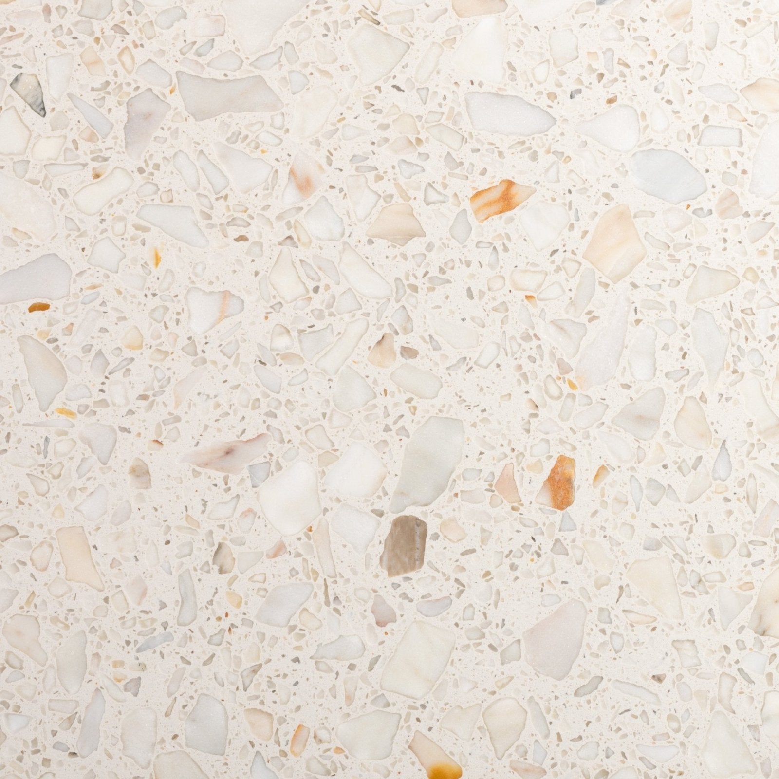 Beige rialto terrazzo veneta honed countertop with white gray and warm orange stone fragments in terrazzo material