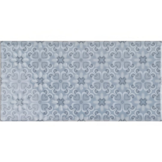 A rectangular ceramic tile rosemoor on snape with a subtle repeating floral pattern in light gray and white