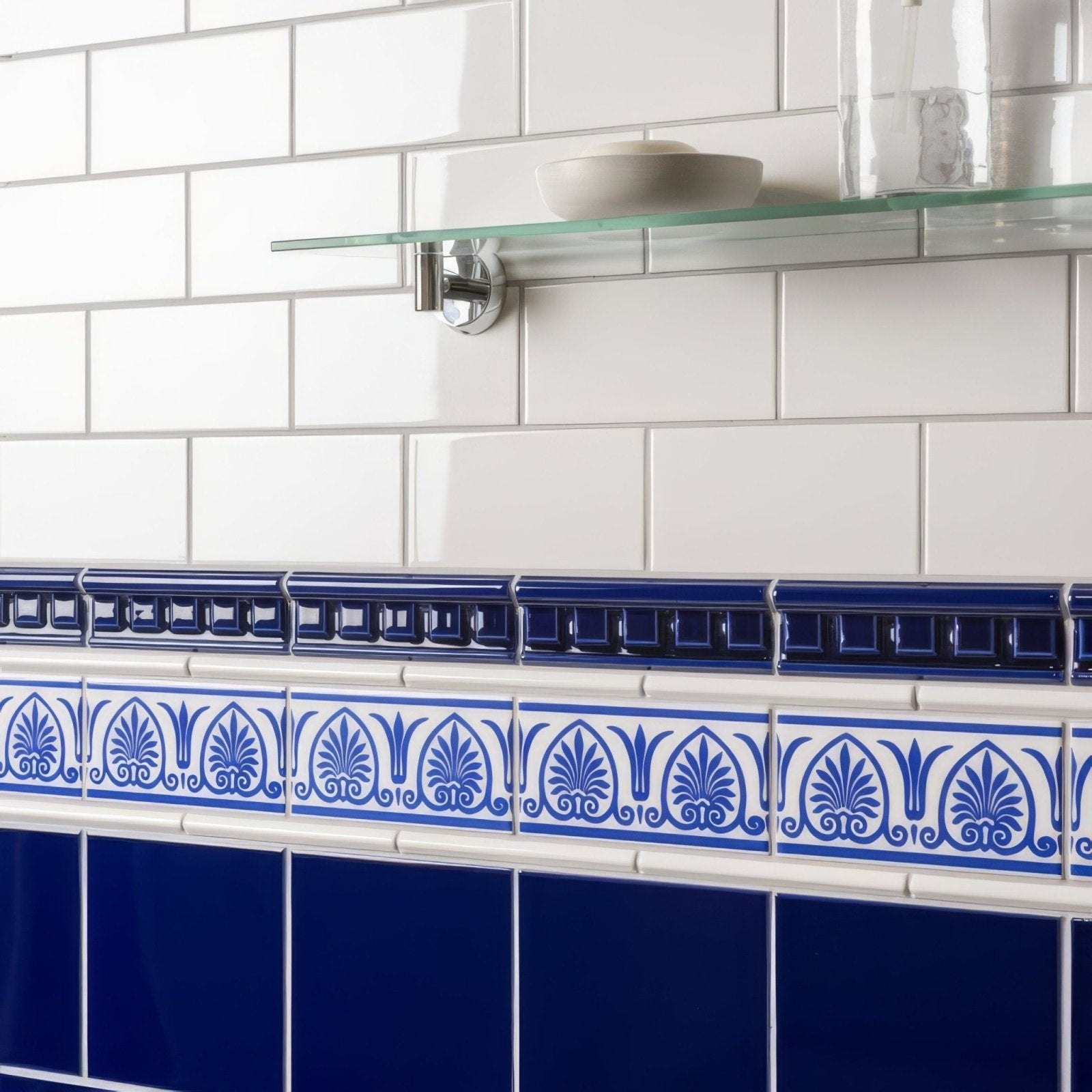 Blue and white ceramic tile border with ornate leaf patterns from royal blue dentil moulding collection