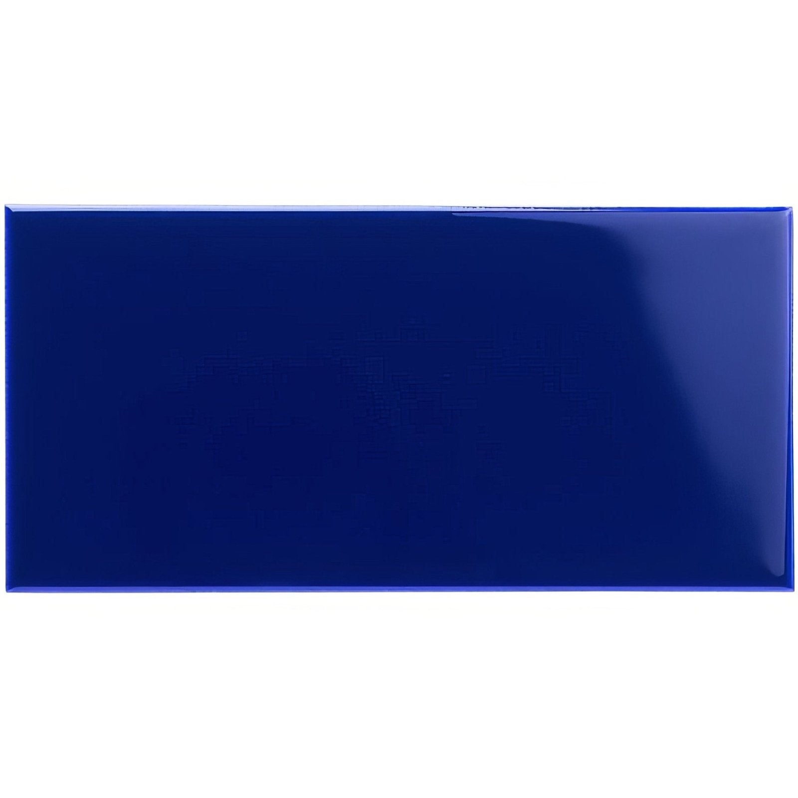 A glossy royal blue half tile made of ceramic with a smooth reflective surface ideal for wall decor