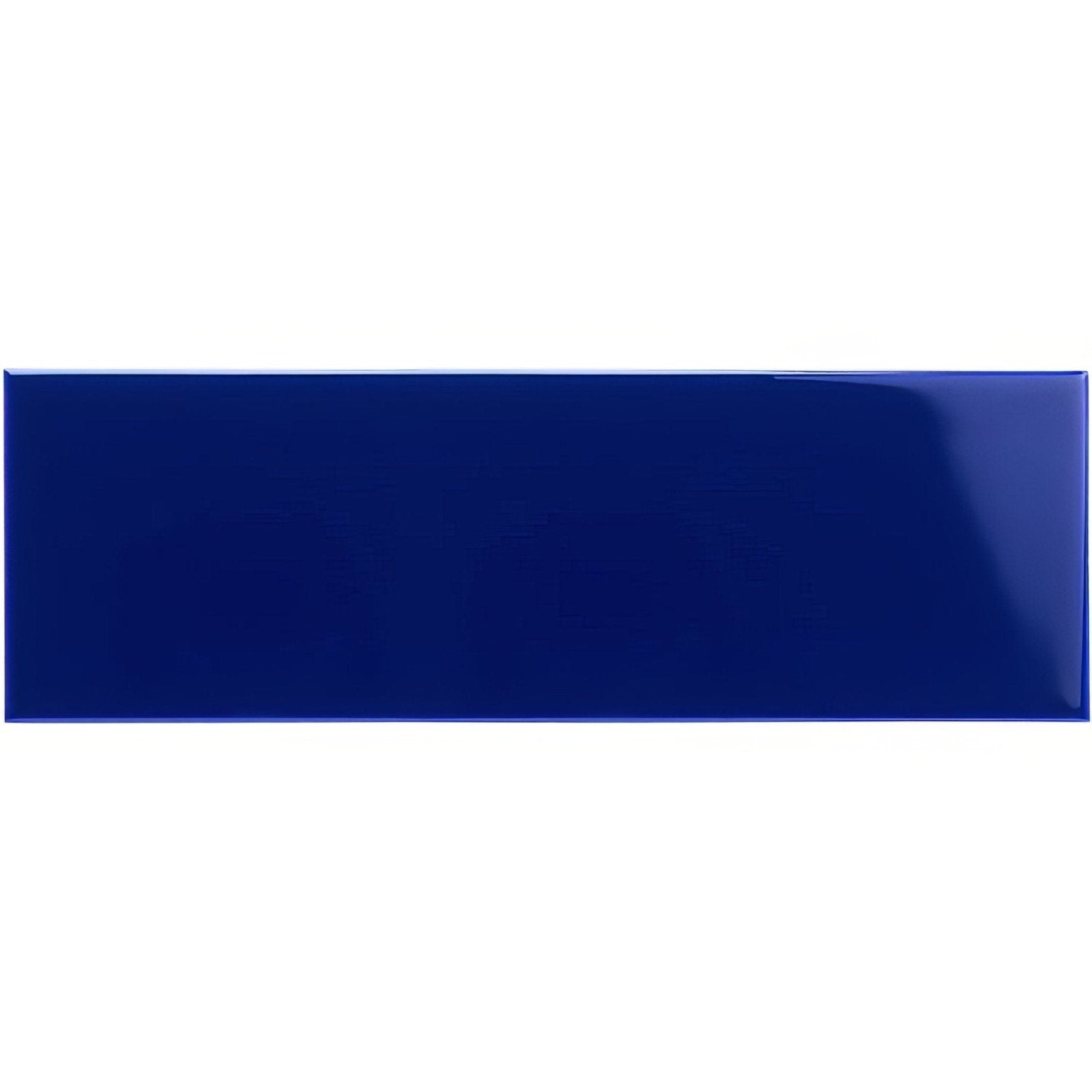 A glossy royal blue large brick ceramic tile with a smooth reflective surface and rectangular shape