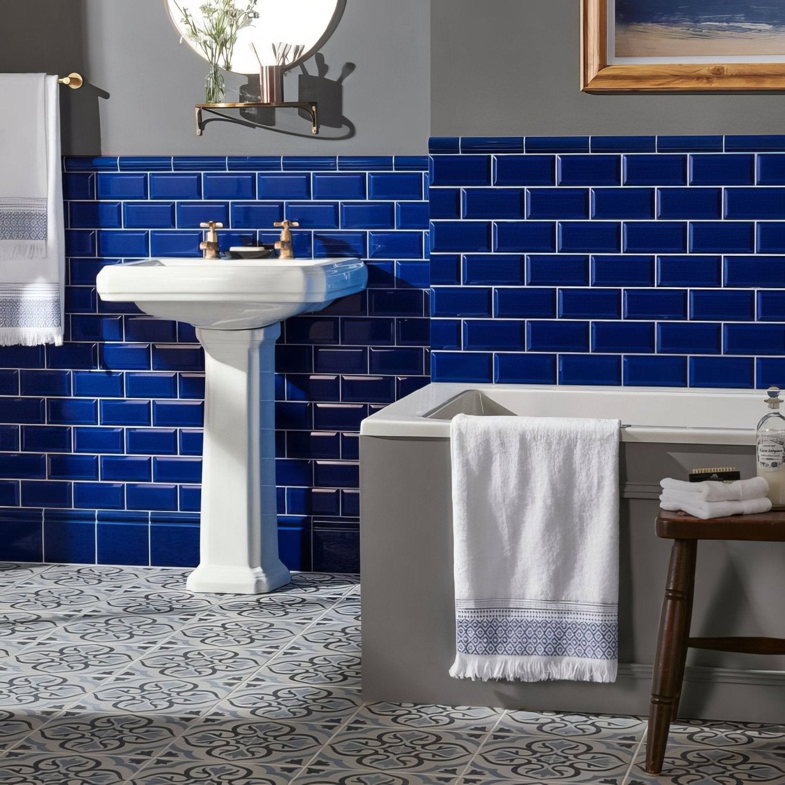 Vibrant cobalt blue royal blue metro bevelled subway tiles with glossy finish lining a bathroom wall