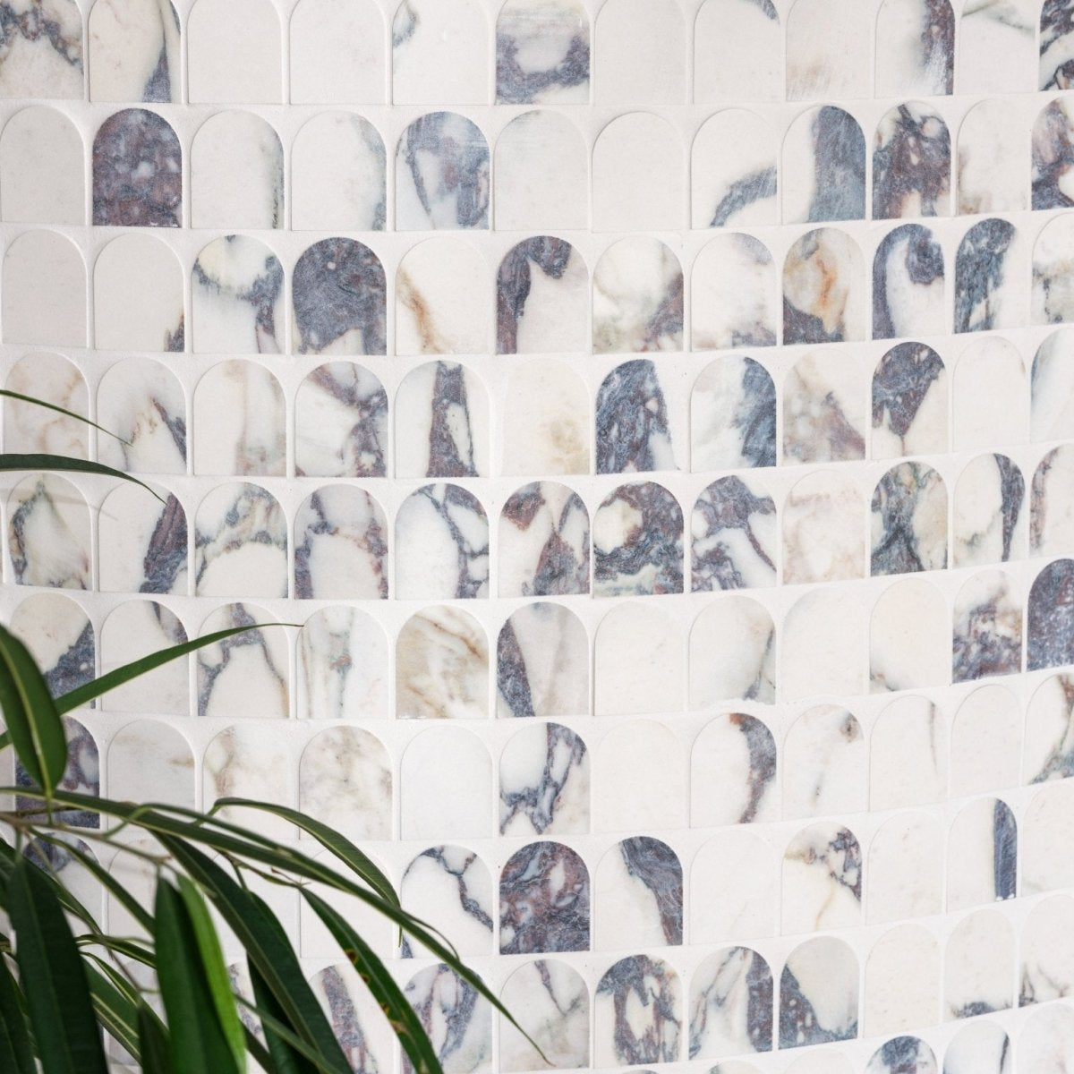 White and gray marble mosaic tile with arched cutouts savoy novo porcelain matt arch mosaic design