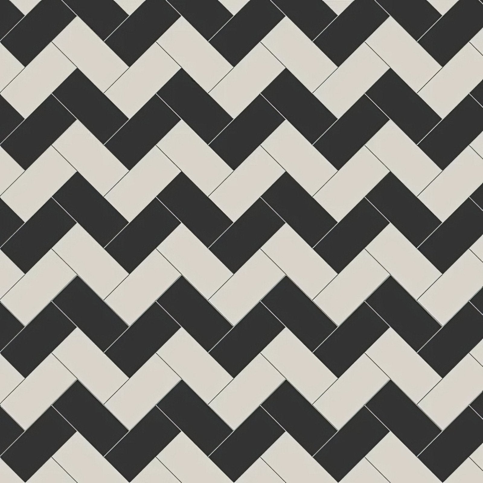 Scarborough black and dover white rectangular ceramic tiles in black and off-white arranged in a herringbone pattern