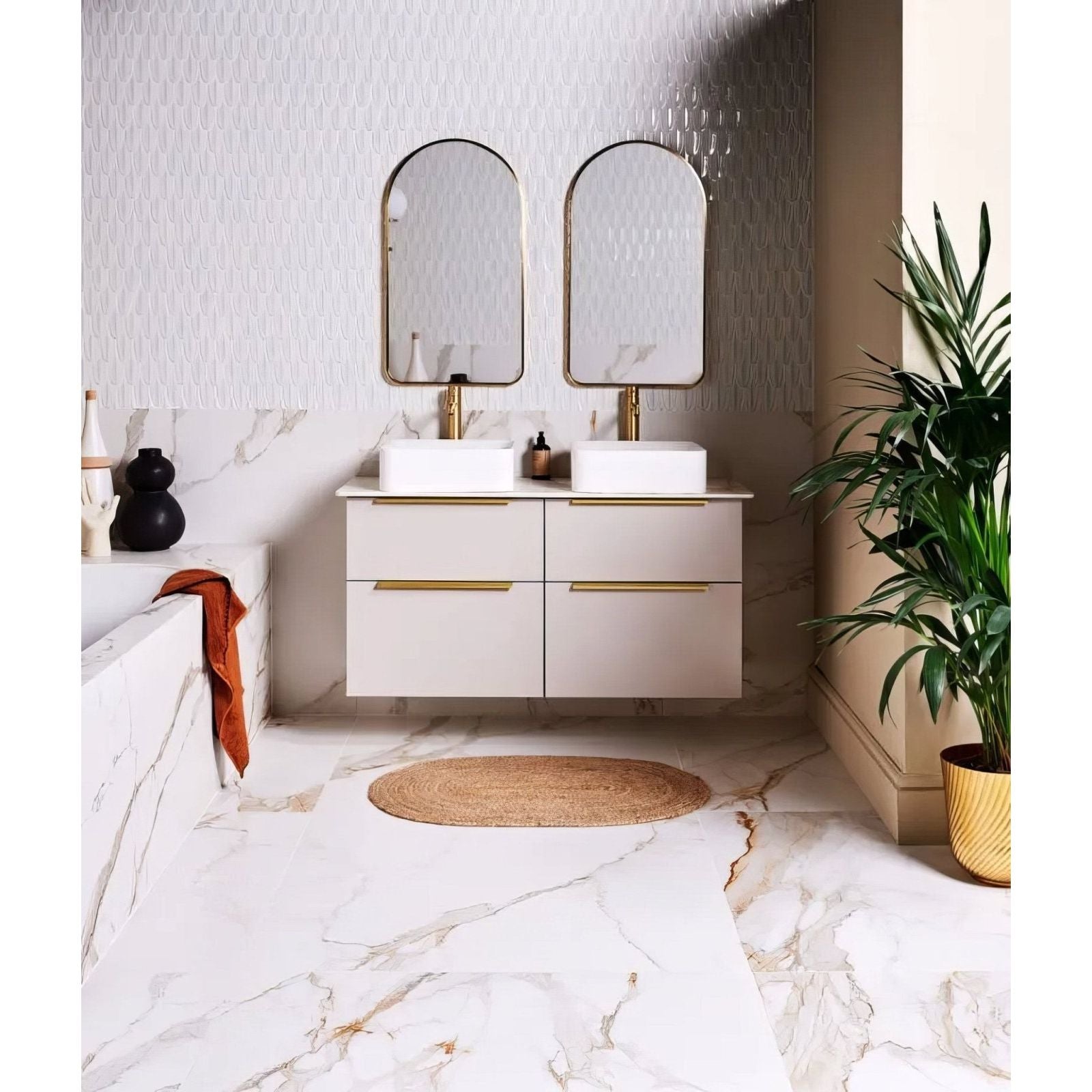 Sculpture Grande Porcelain Calacatta Maximus white marble-effect tiles with a floating vanity and two sinks