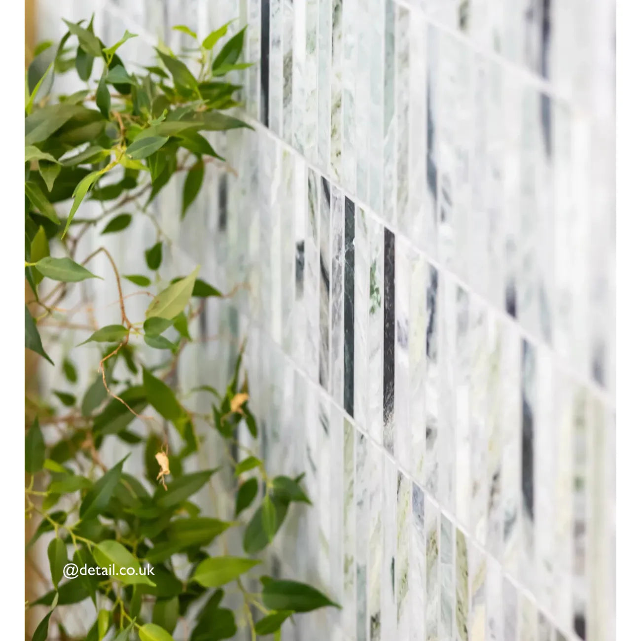 Seaspray green stacked mosaic white and black marble tile wall showcasing elegant marble mosaic pattern