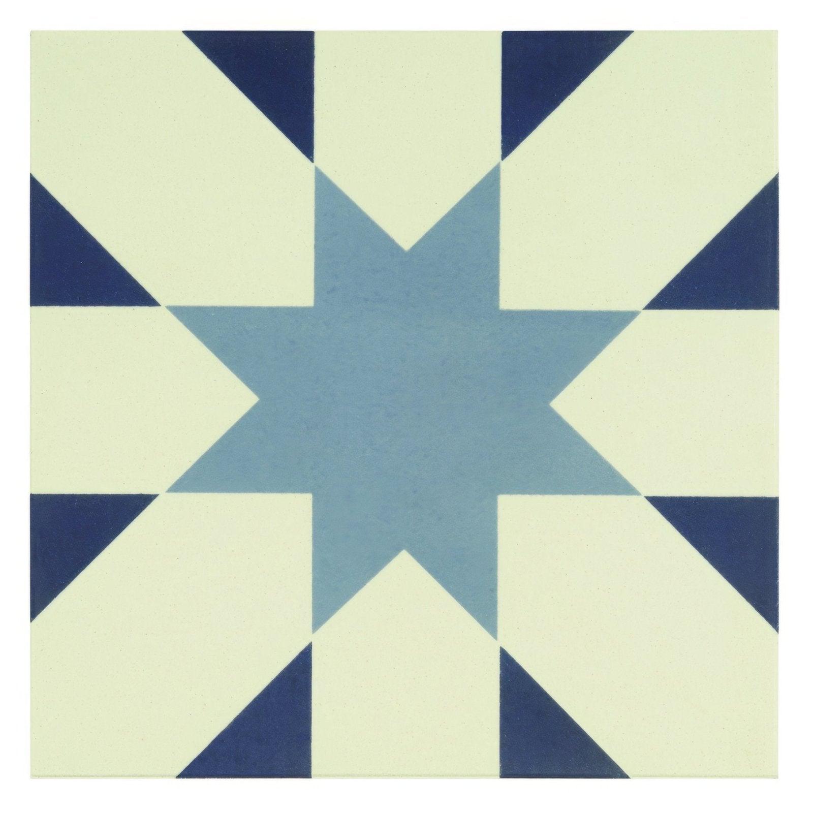 Blue star-shaped tile with navy and cream geometric pattern seville light blue on dover white background