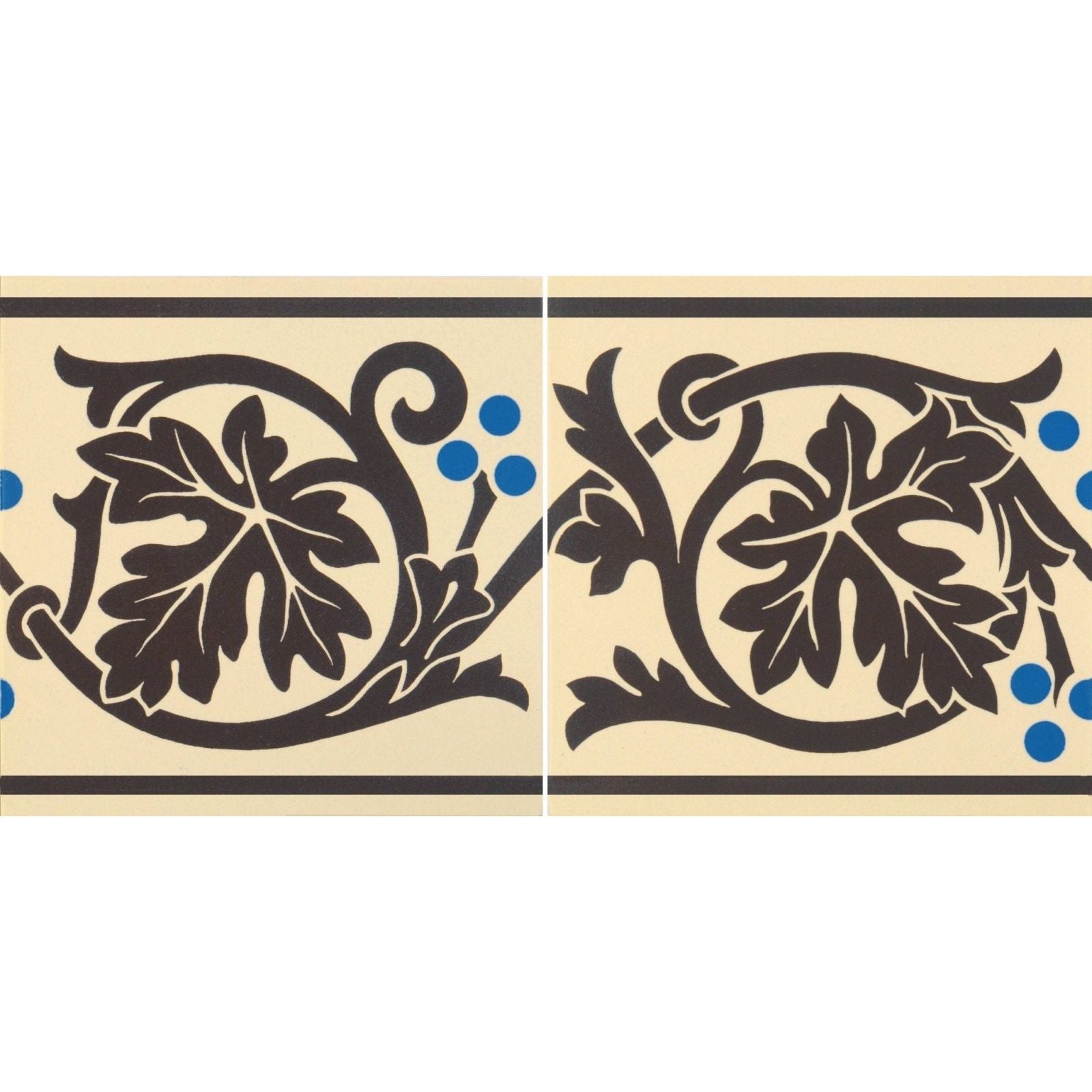 Cream-colored ceramic tile border with bold black vine and leaf patterns accented by small blue dots shaftesbury 2 brown on white
