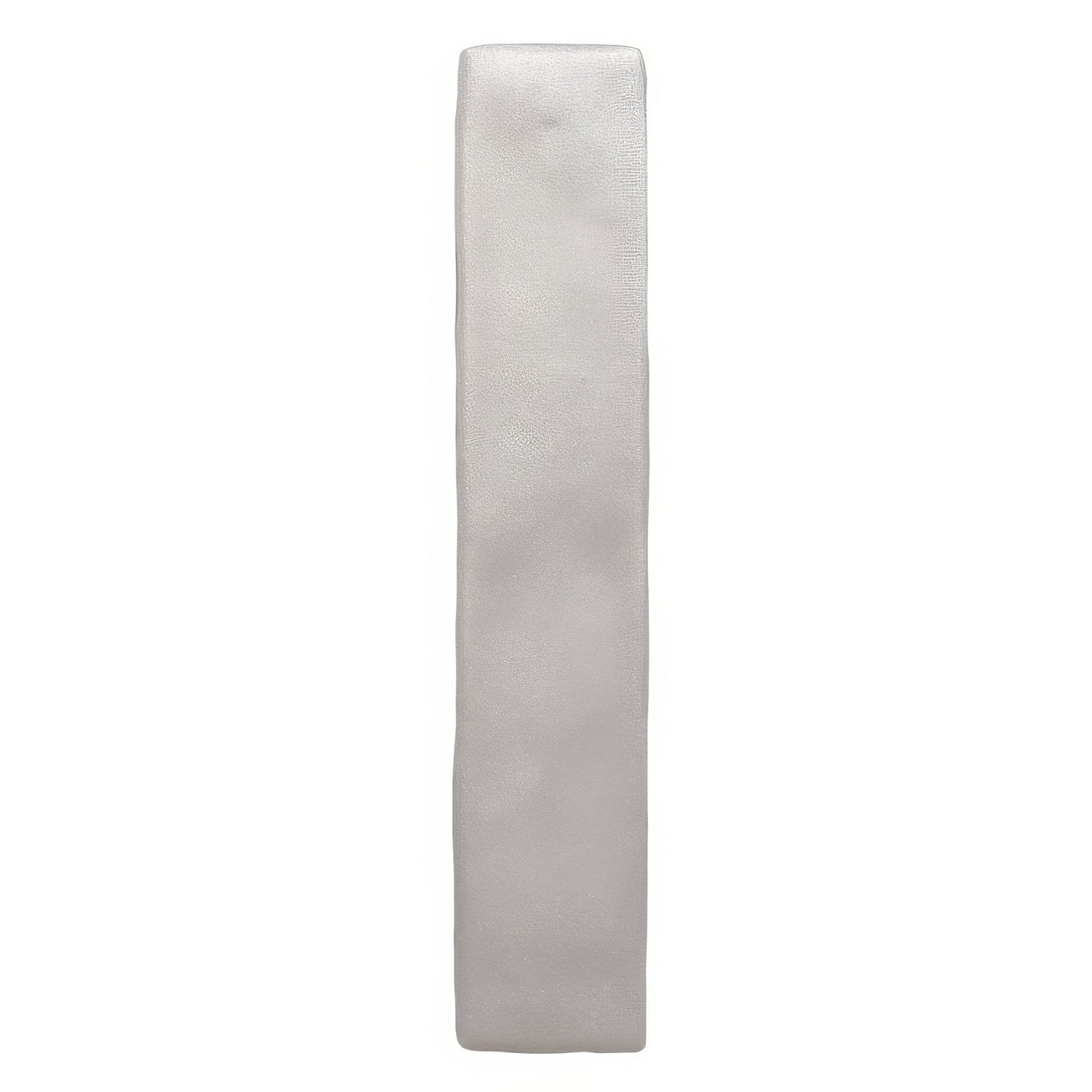 A sleek rectangular silver metal sherbet grey brick 5x25cm with a smooth slightly textured surface
