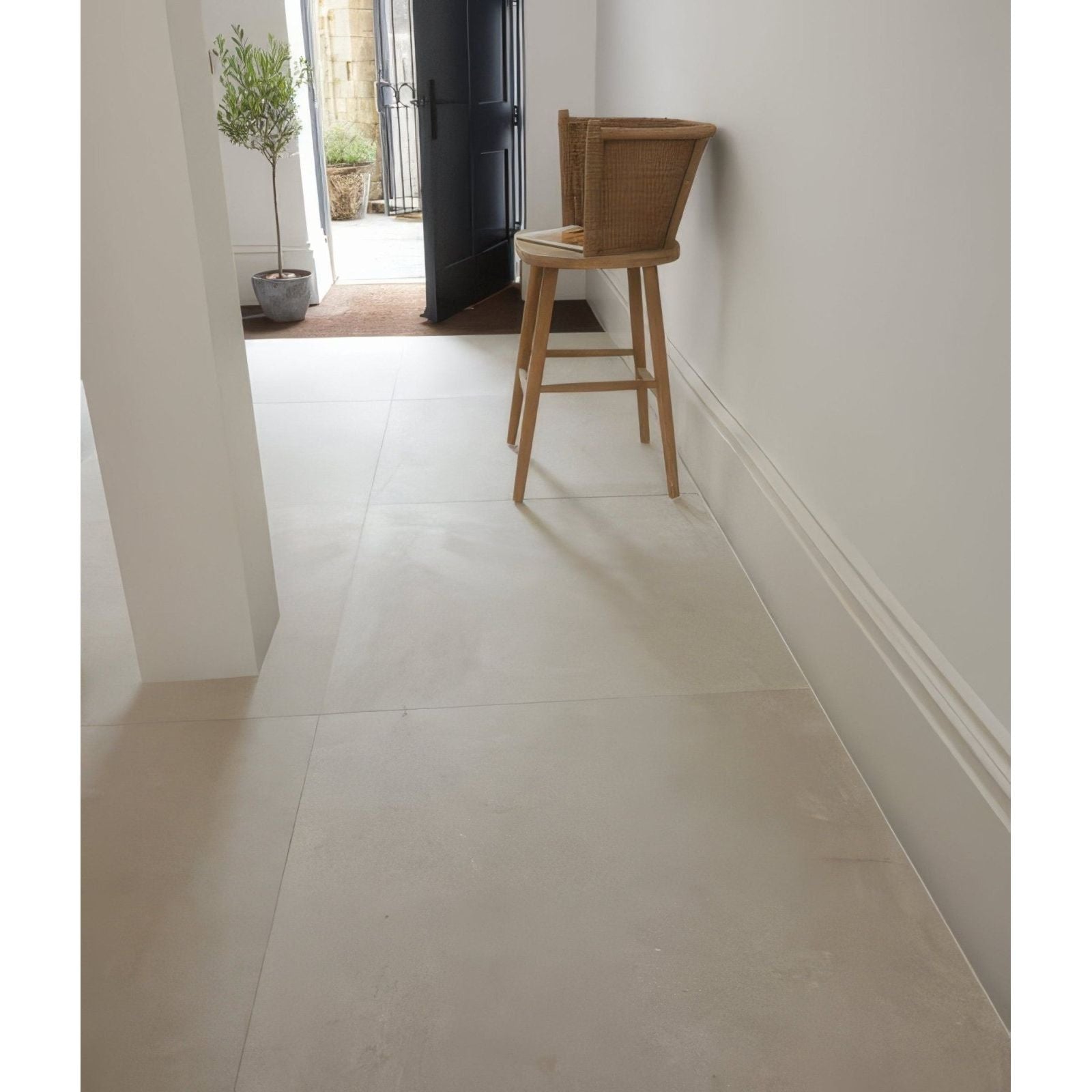 Sherborne porcelain light light beige matte ceramic tile floor with subtle grout lines for indoor use