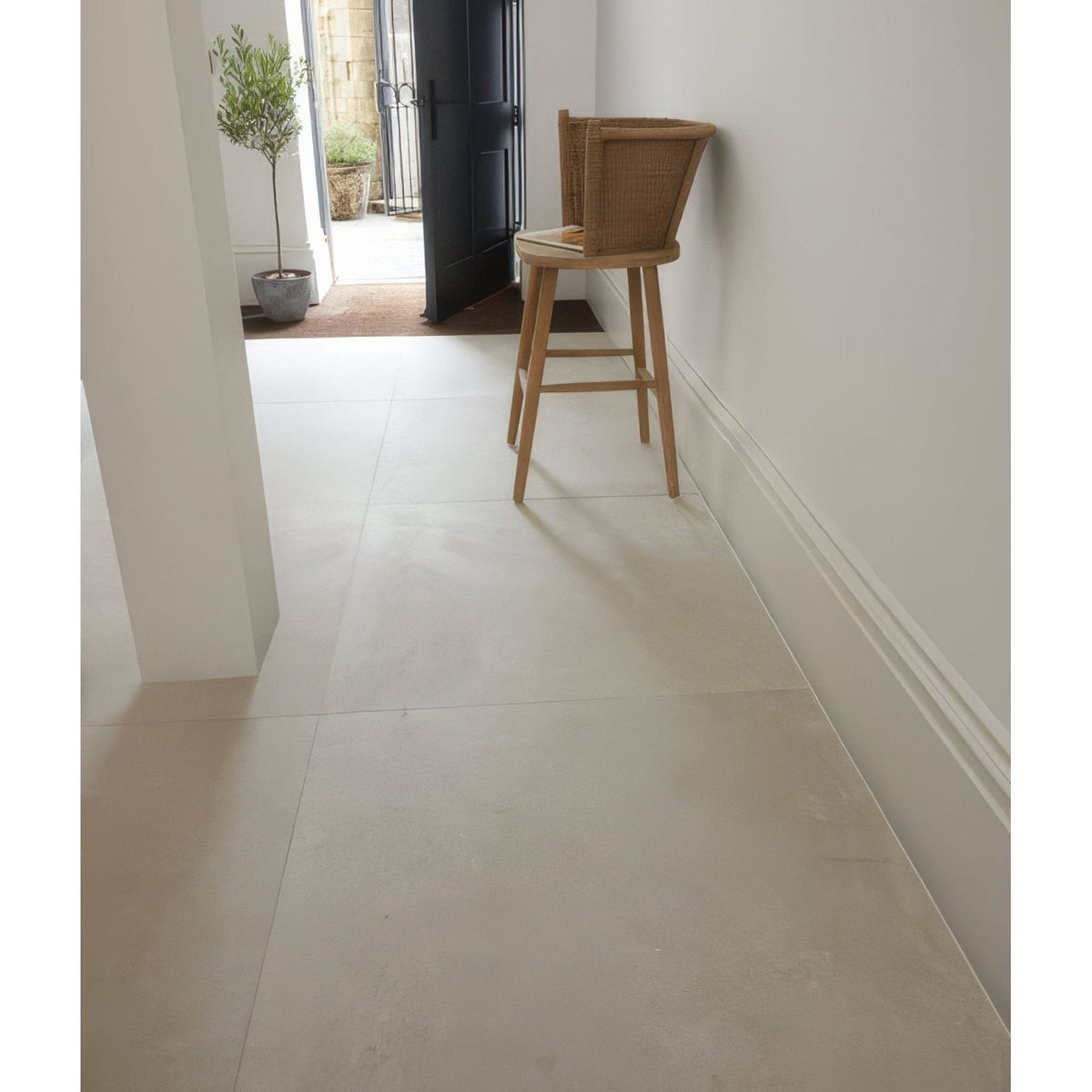 Sherborne porcelain light light beige matte ceramic tile floor with subtle grout lines for indoor use