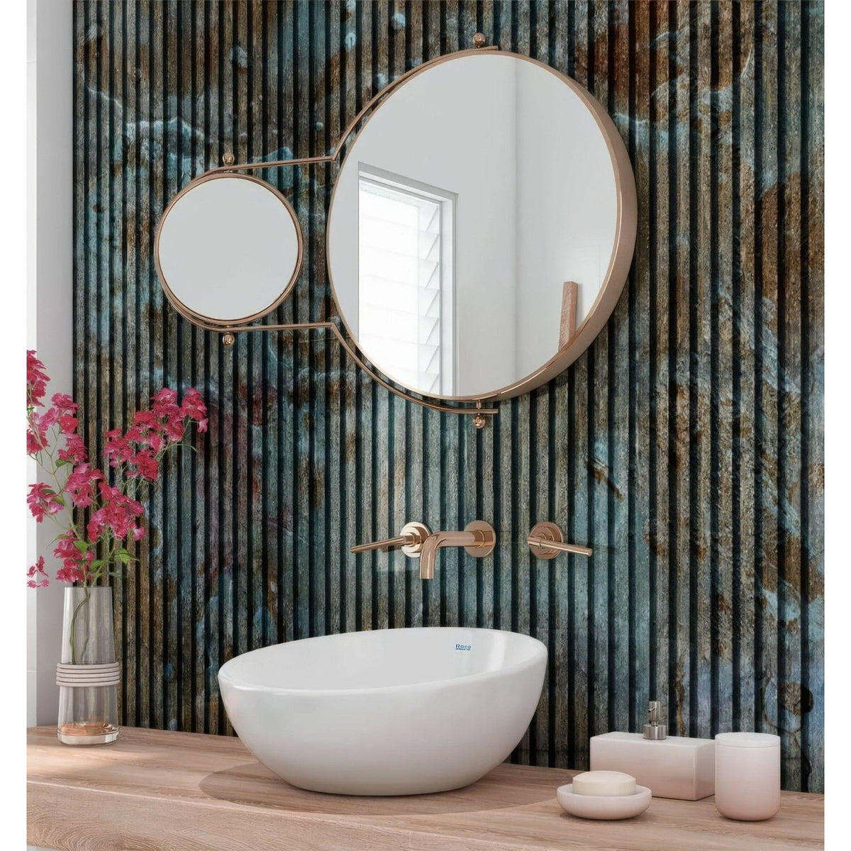 Round rose gold framed bathroom mirror with minimalist design on shower panel blue concrete slat wall background