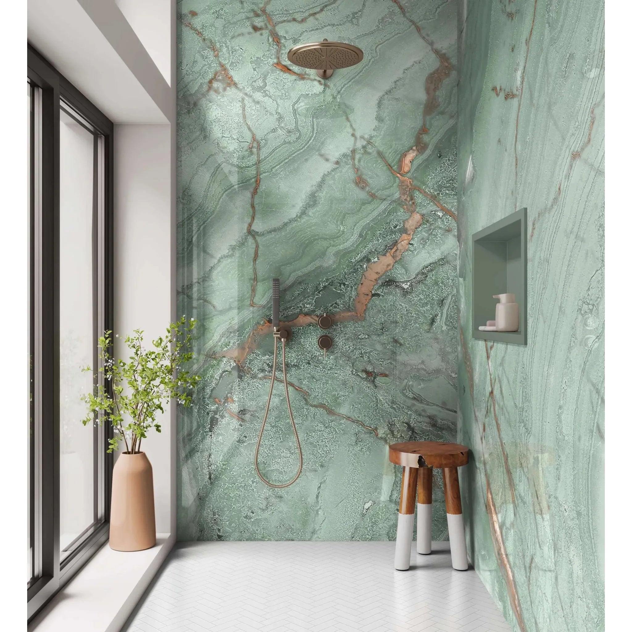 Shower panel olive green marble with a round gold-toned polished showerhead fixture for elegant bathroom style
