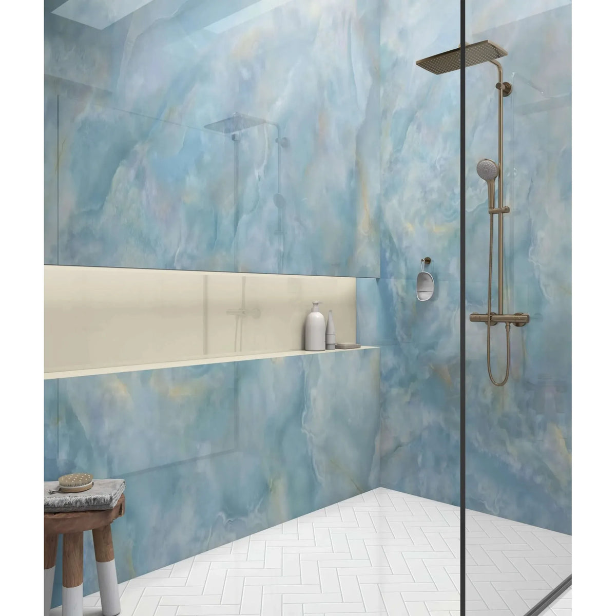 Modern brass-finished shower panel onyx crystal carte d’or blue with square rain showerhead and handheld spray nozzle