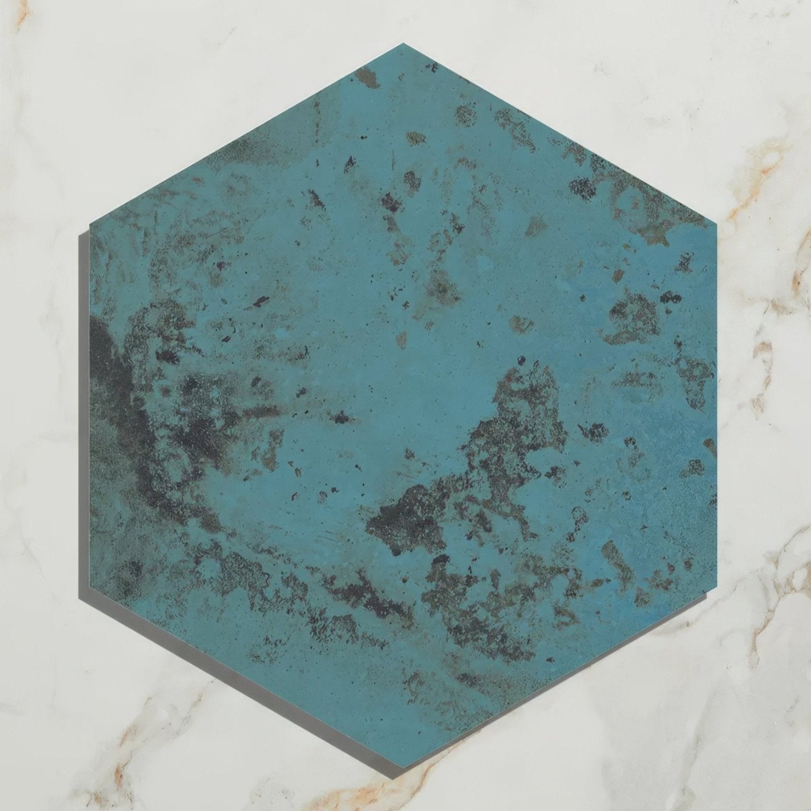 Hexagonal porcelain tile with distressed turquoise finish and dark patina accents from Signature Porcelain Verdigris collection