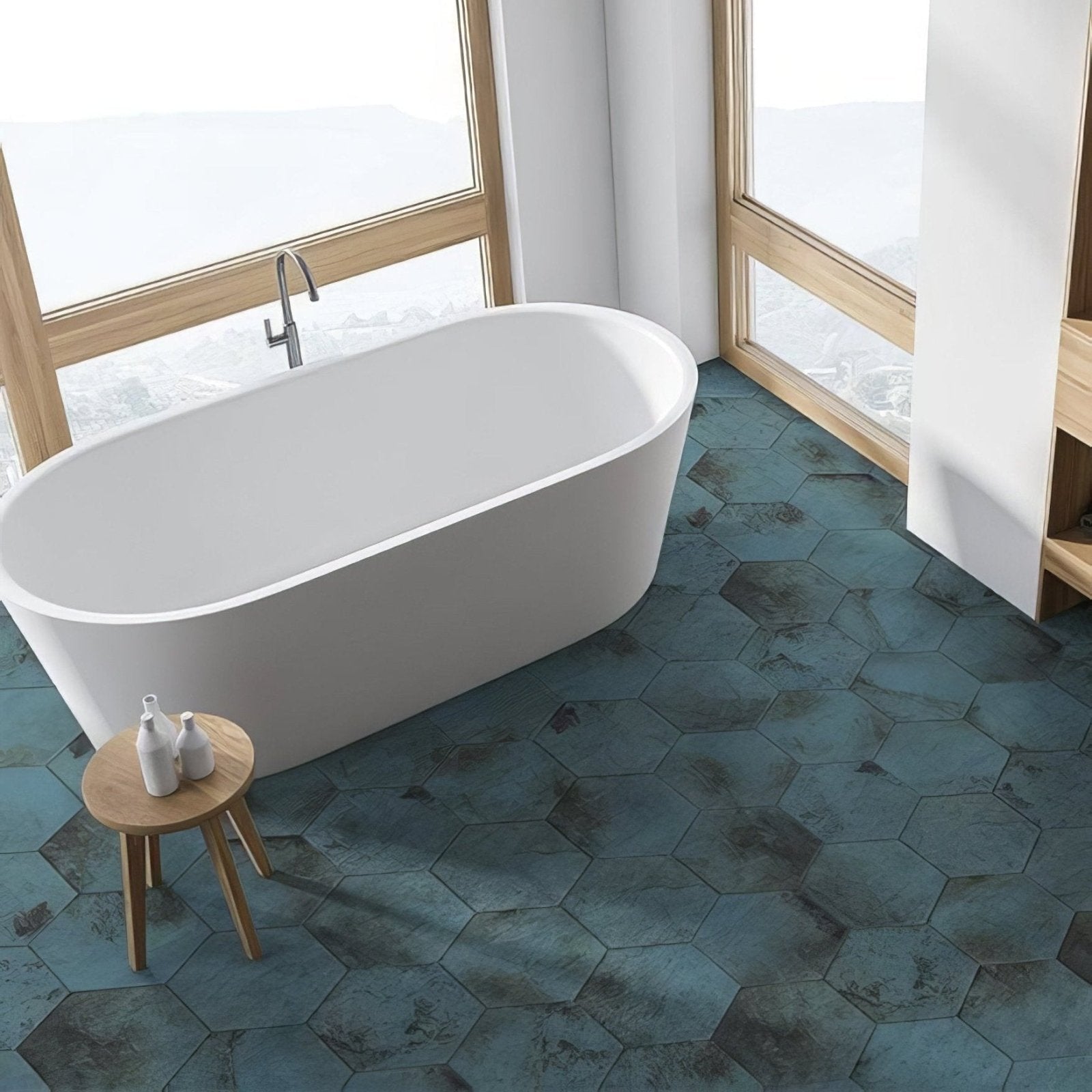 Modern freestanding bathtub with sleek white porcelain finish and minimalist design from signature porcelain verdigris collection