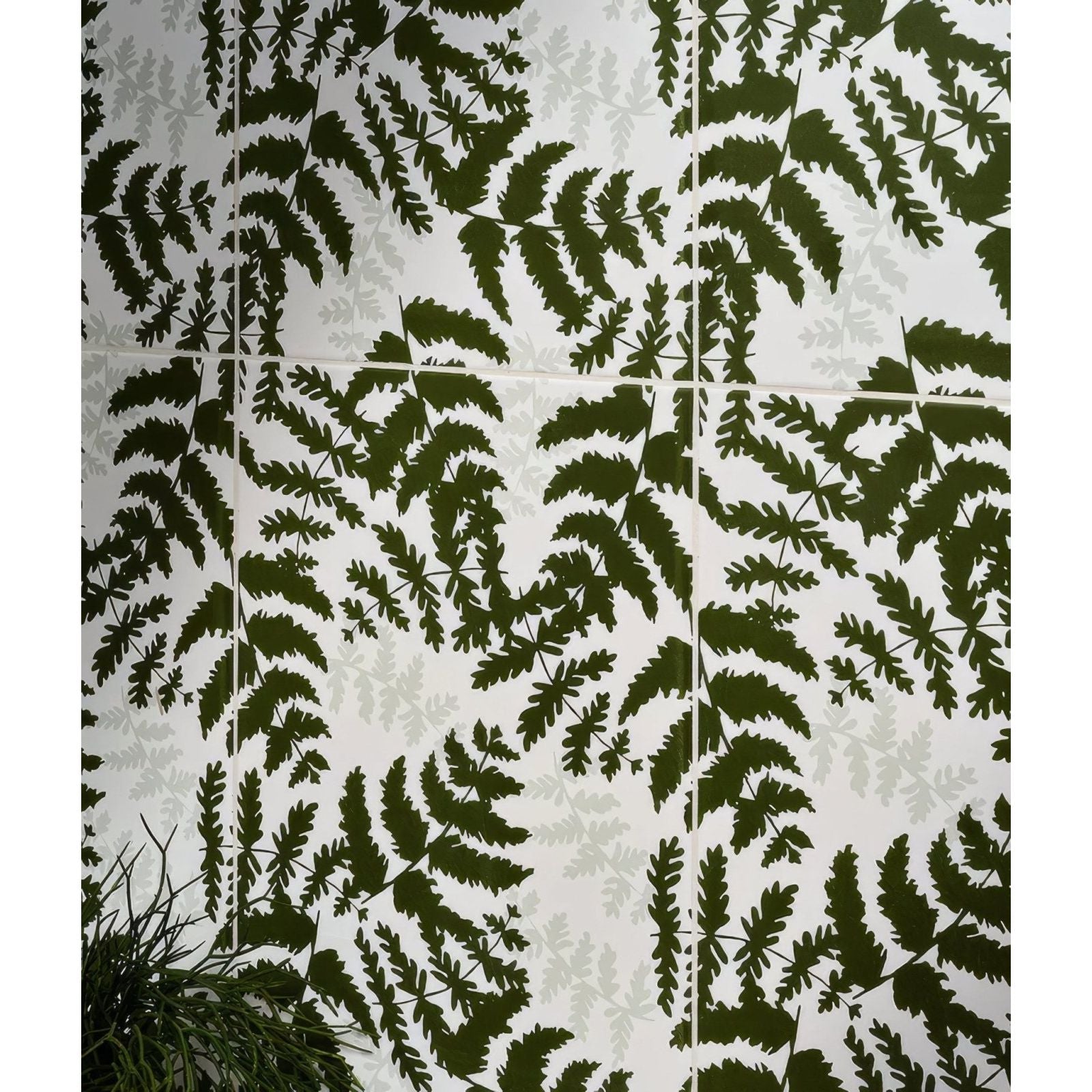 White ceramic tiles with bold dark green fern leaf pattern from silk screen ceramic fernery collection