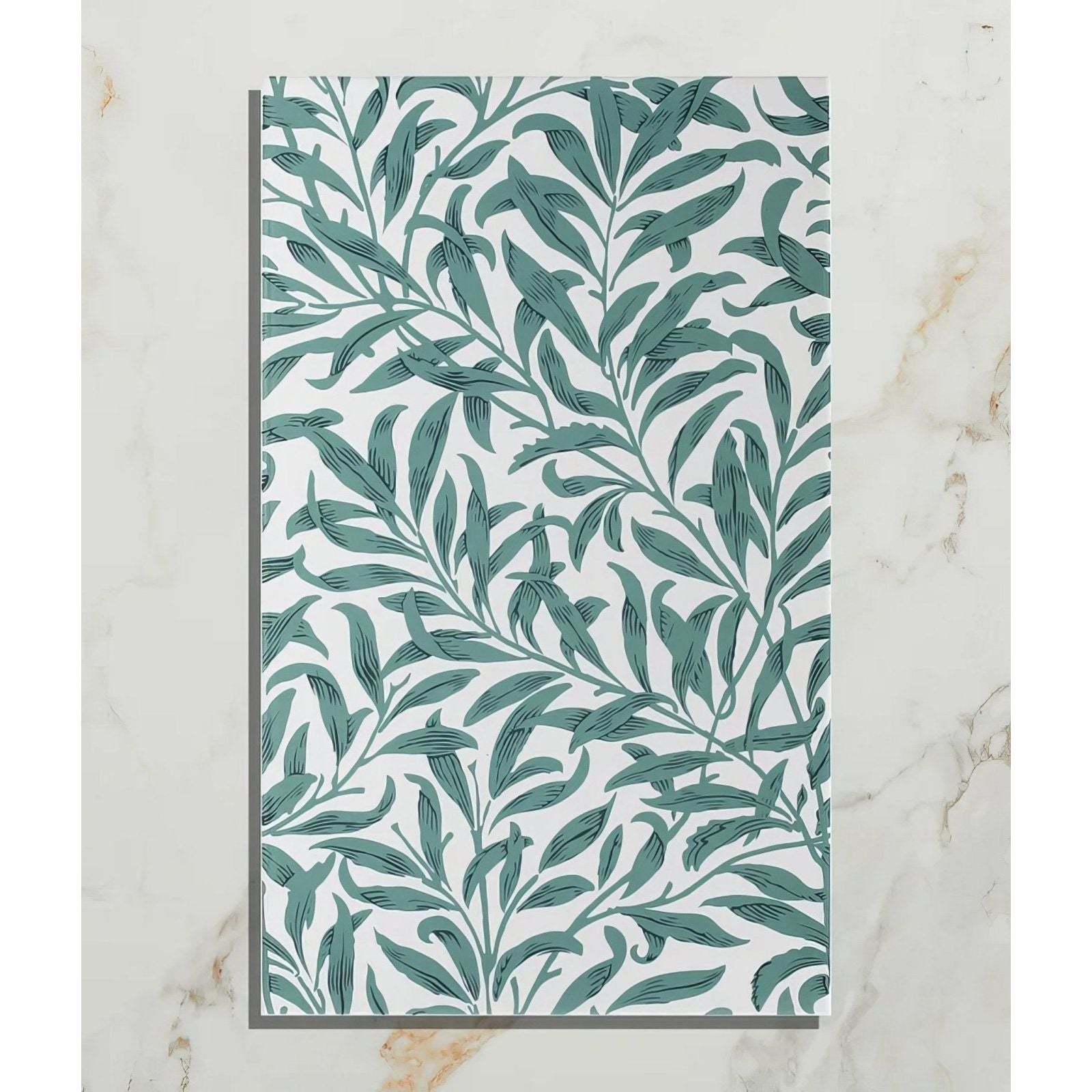 A rectangular silk screen ceramic tile featuring an intricate repeating pattern of green leaves on a white background