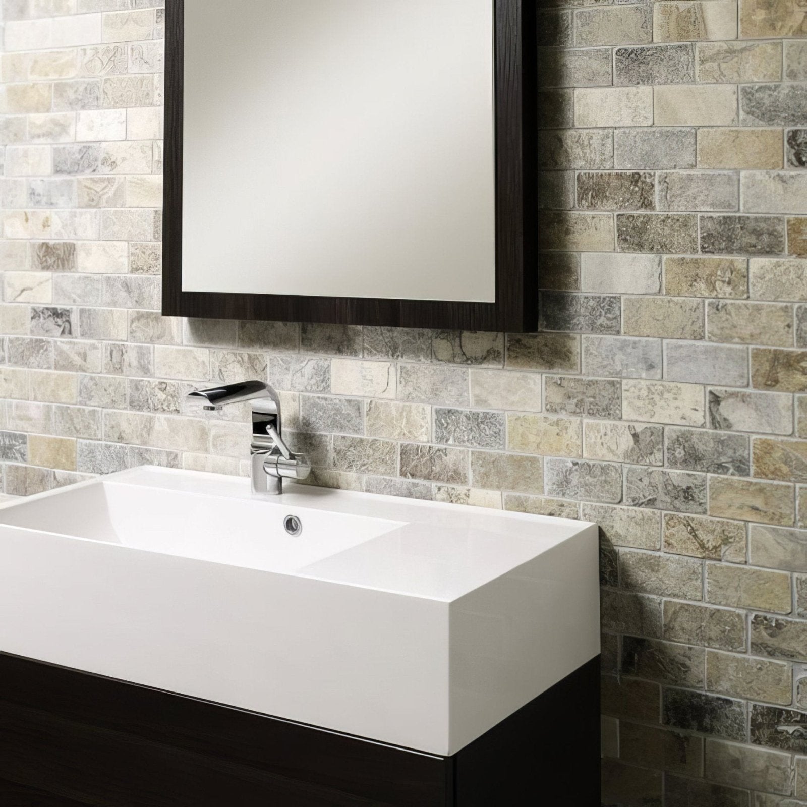 Silver Grey Travertine Brick Mosaic grey travertine brick mosaic with a white sink on a dark wood vanity